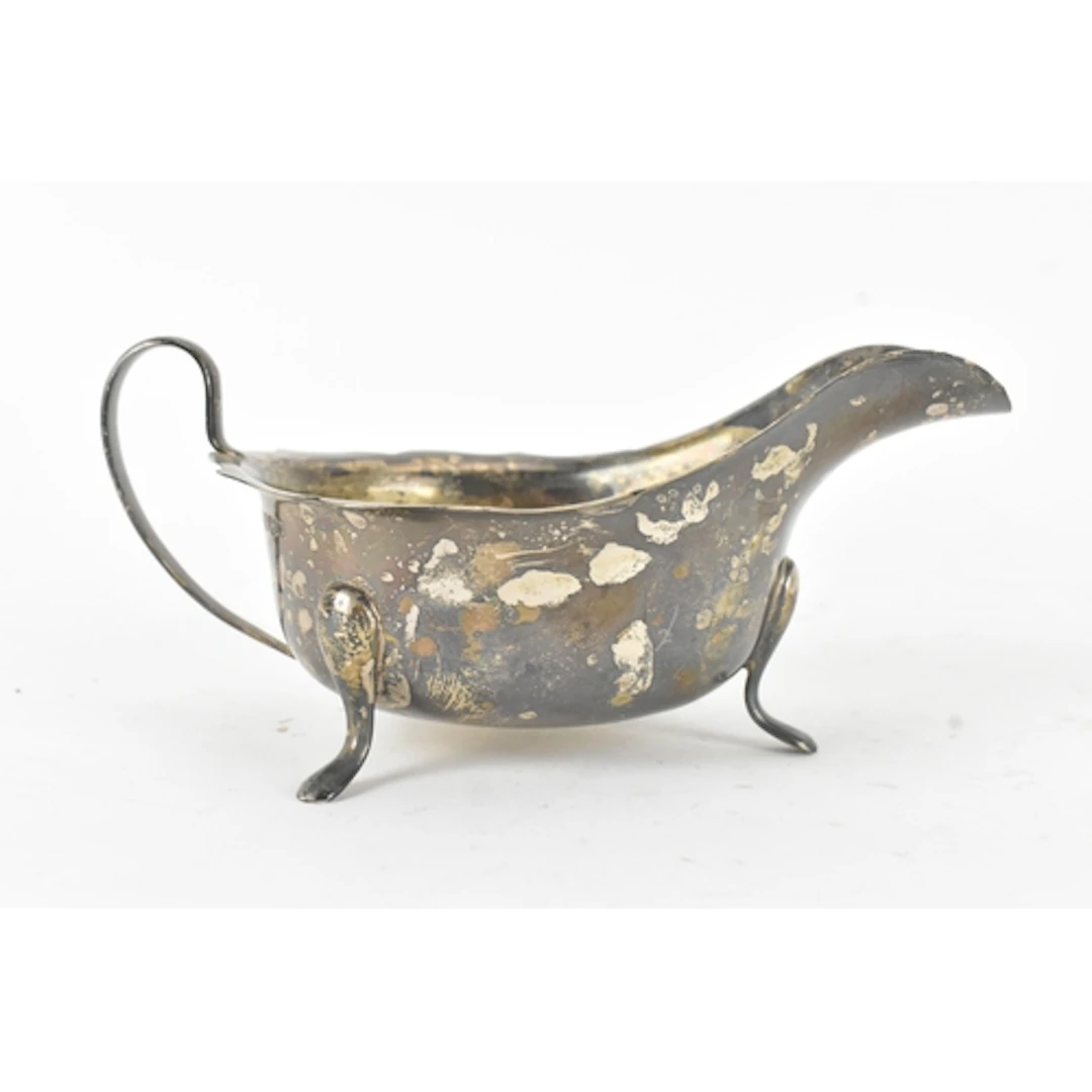 A George VI silver sauce boat, by Viner's Ltd (Emile Viner),...