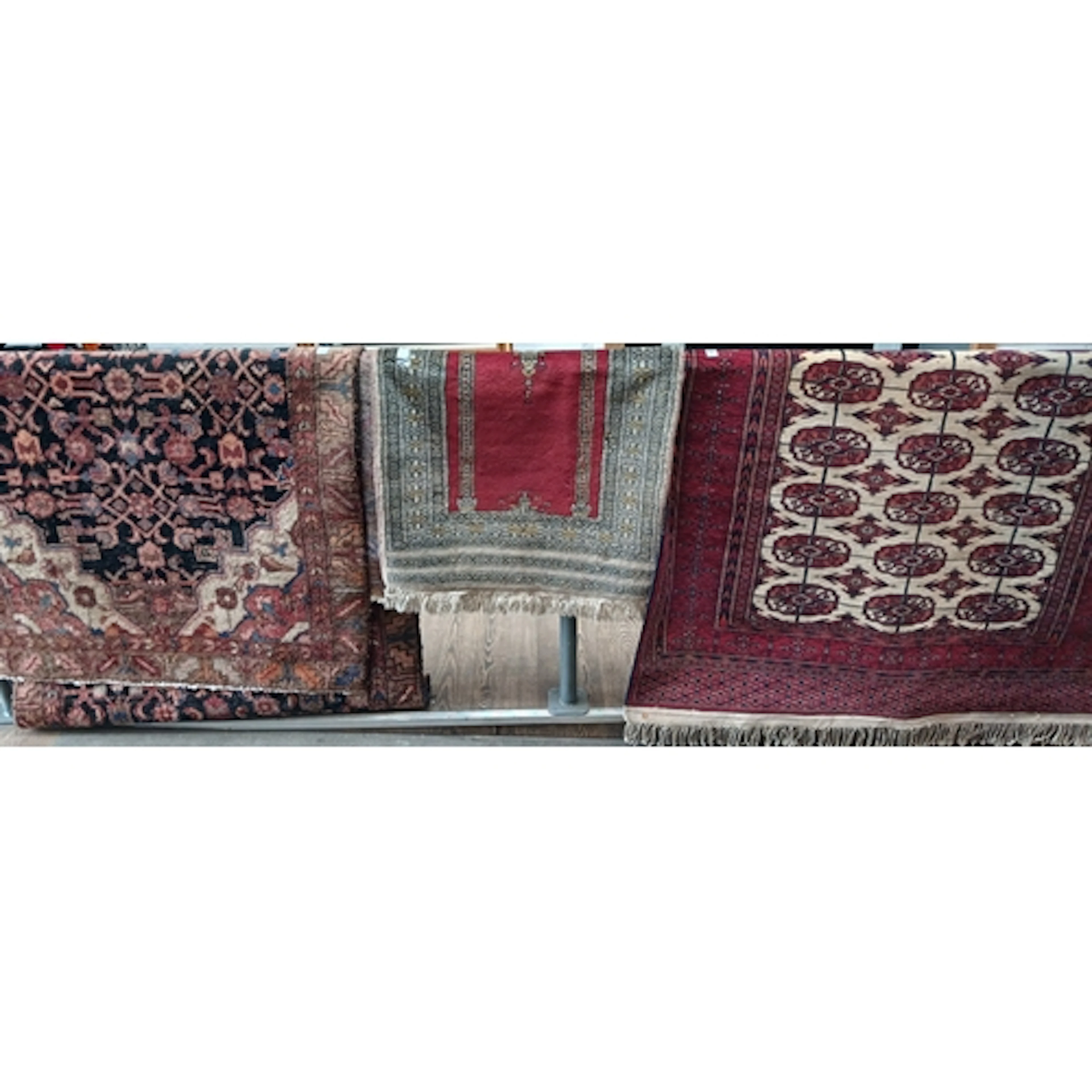 Three assorted eastern carpets.