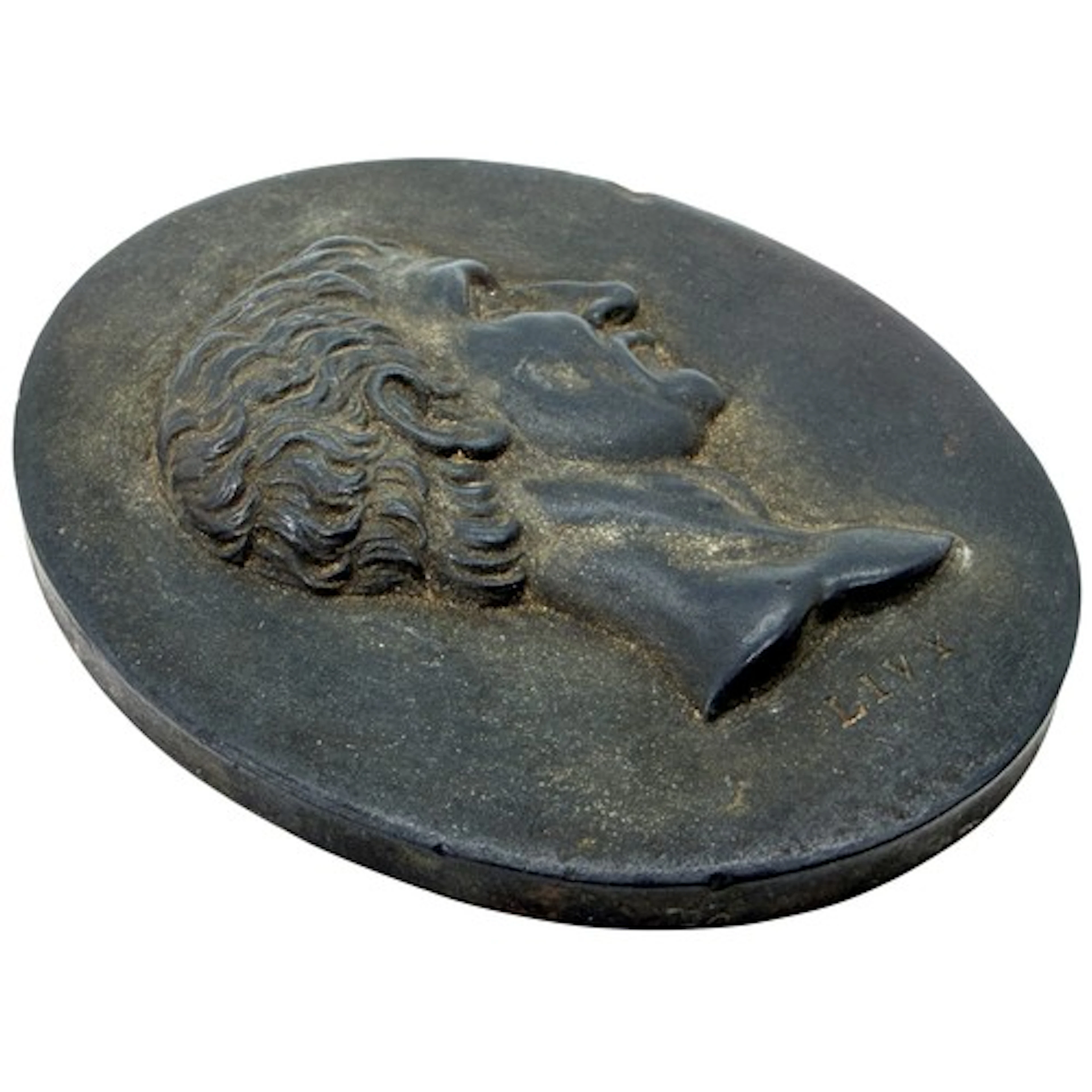 A Wedgwood black basalt plaque of oval form, moulded in reli...