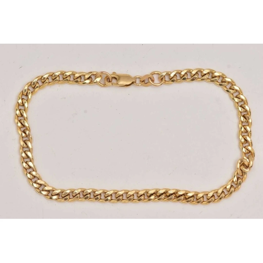 A 9CT GOLD CURB LINK BRACELET, fitted with a lobster clasp, ...
