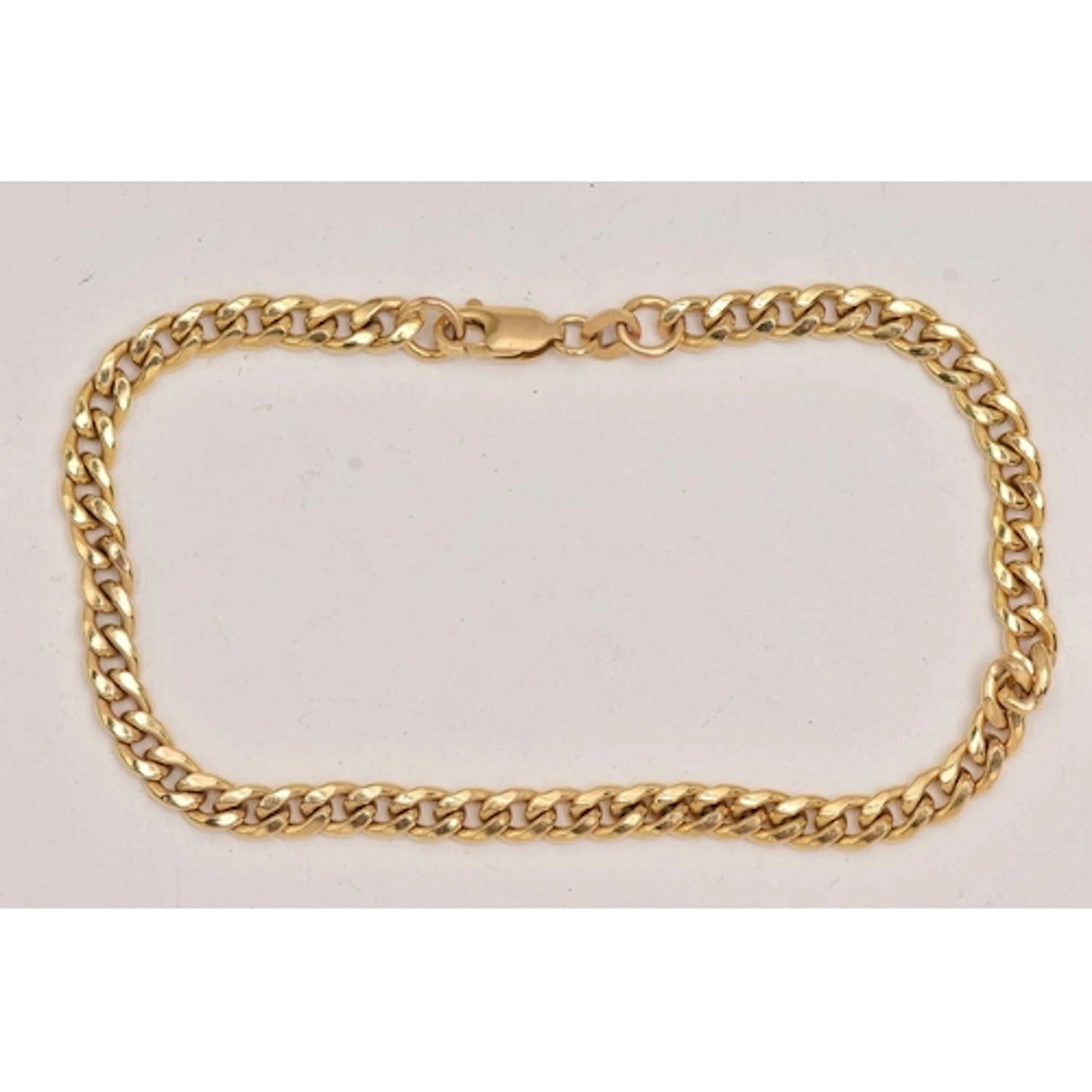 A 9CT GOLD CURB LINK BRACELET, fitted with a lobster clasp, ...