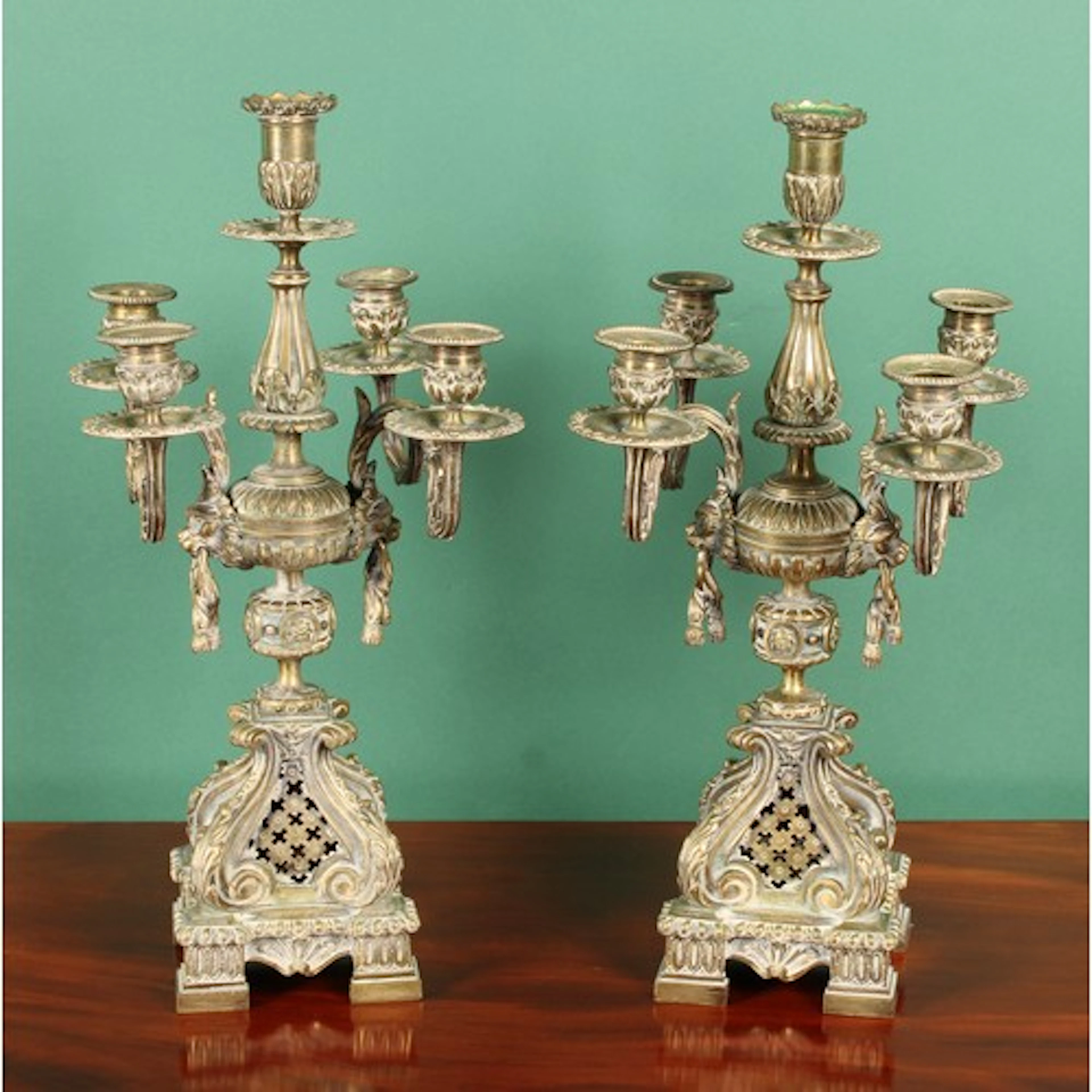 A pair of 19th century bronze five-light candelabra, cast in...