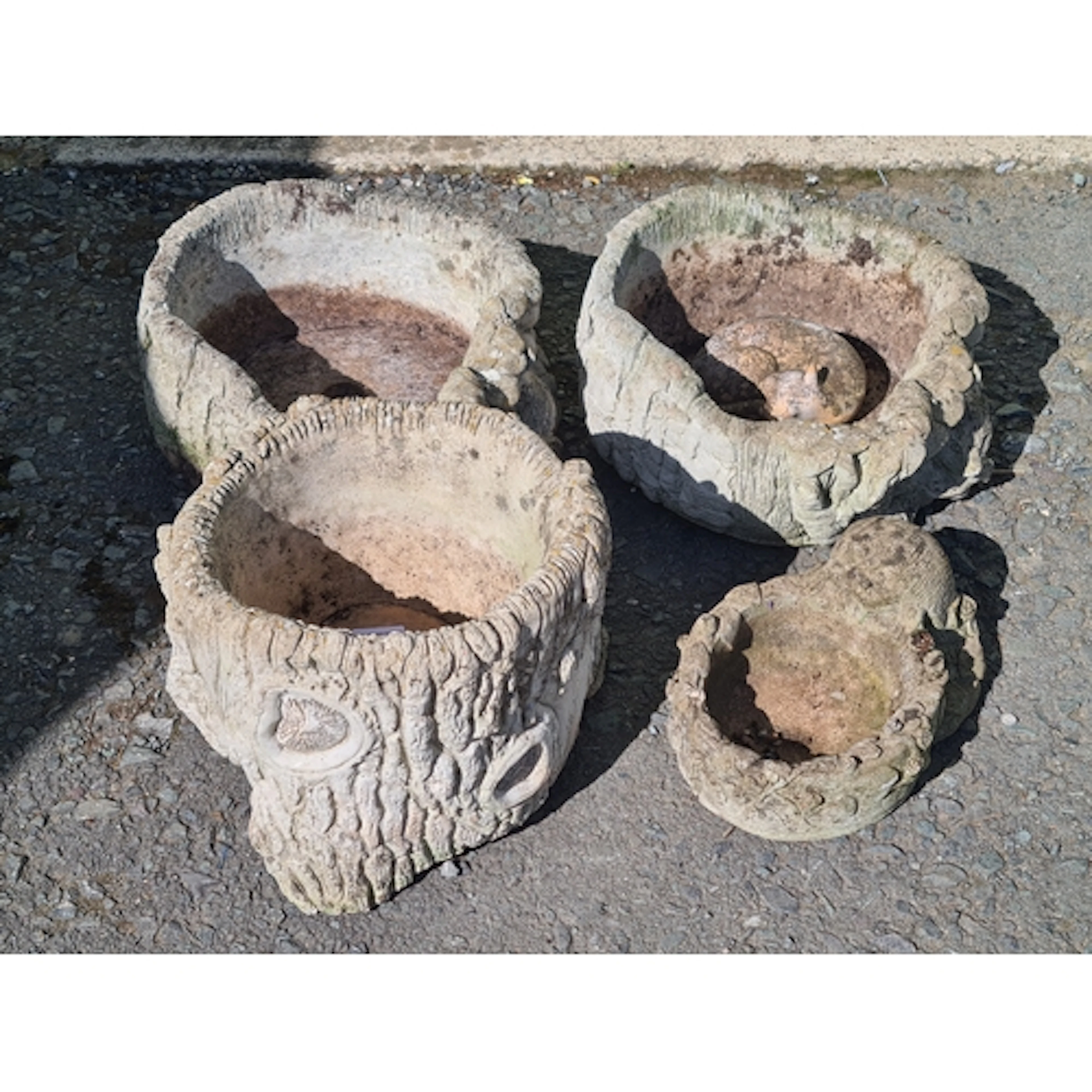 Four Composite Garden Planters., three with Hedgehog designs...