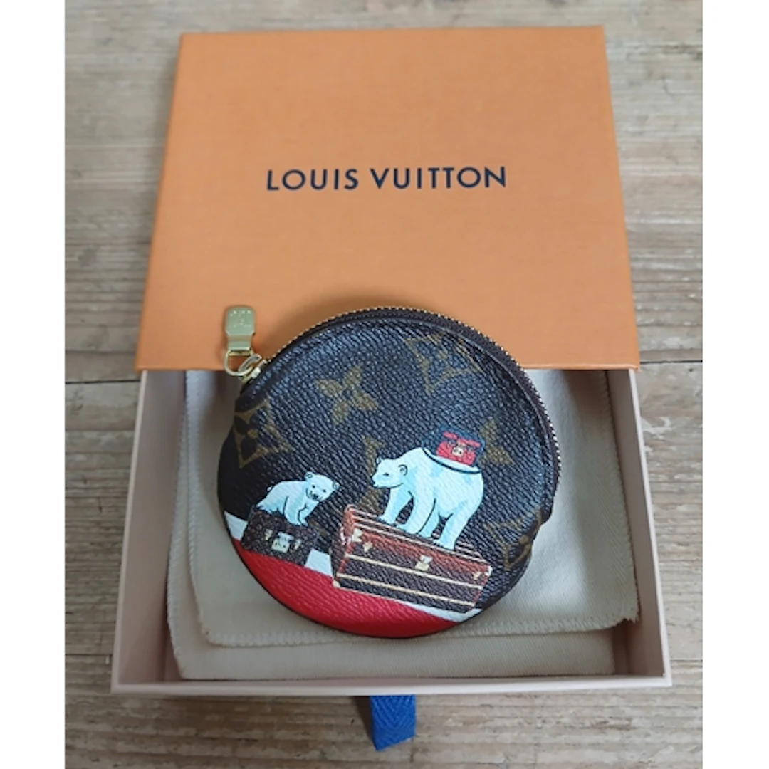 LOUIS VUITTON, a monogram leather animation zippy pouch with...
