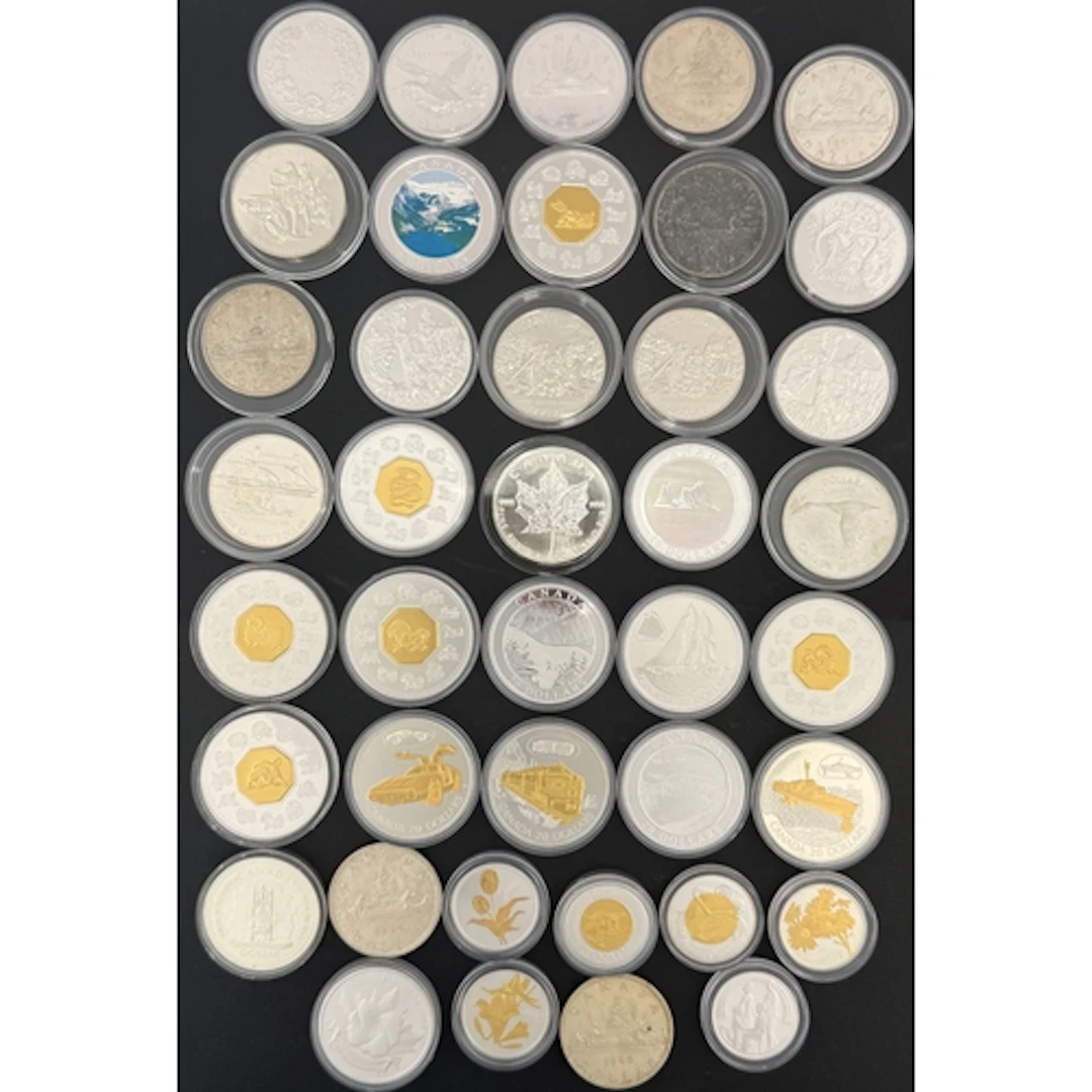 A collection of 38 Canadian silver coins, comprising 50 Cent...
