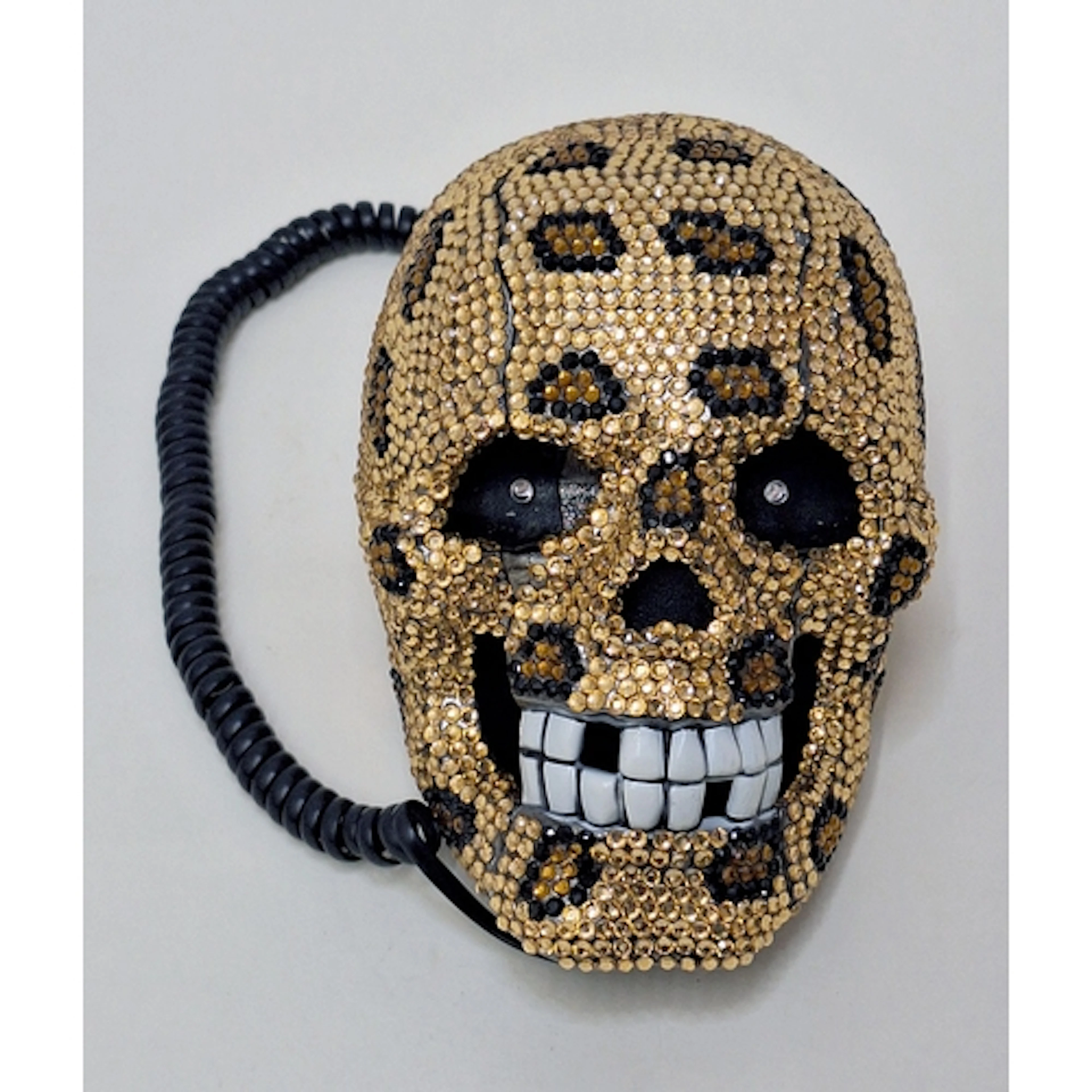 Gold diamante animal print patterned skull telephone, approx...