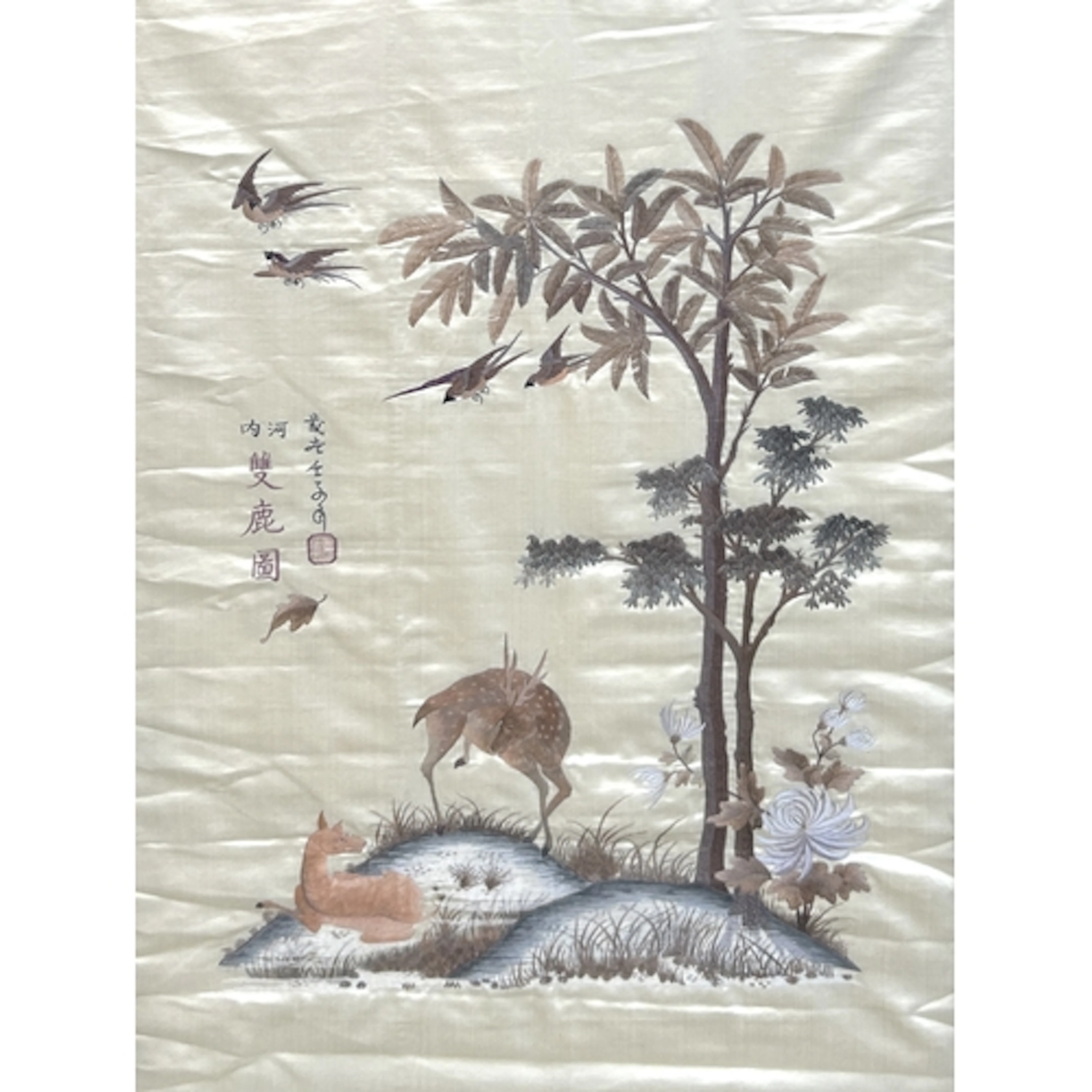 A CHINESE SILK EMBROIDERY OF TWO DEER BENEATH A TREE 78cm x ...