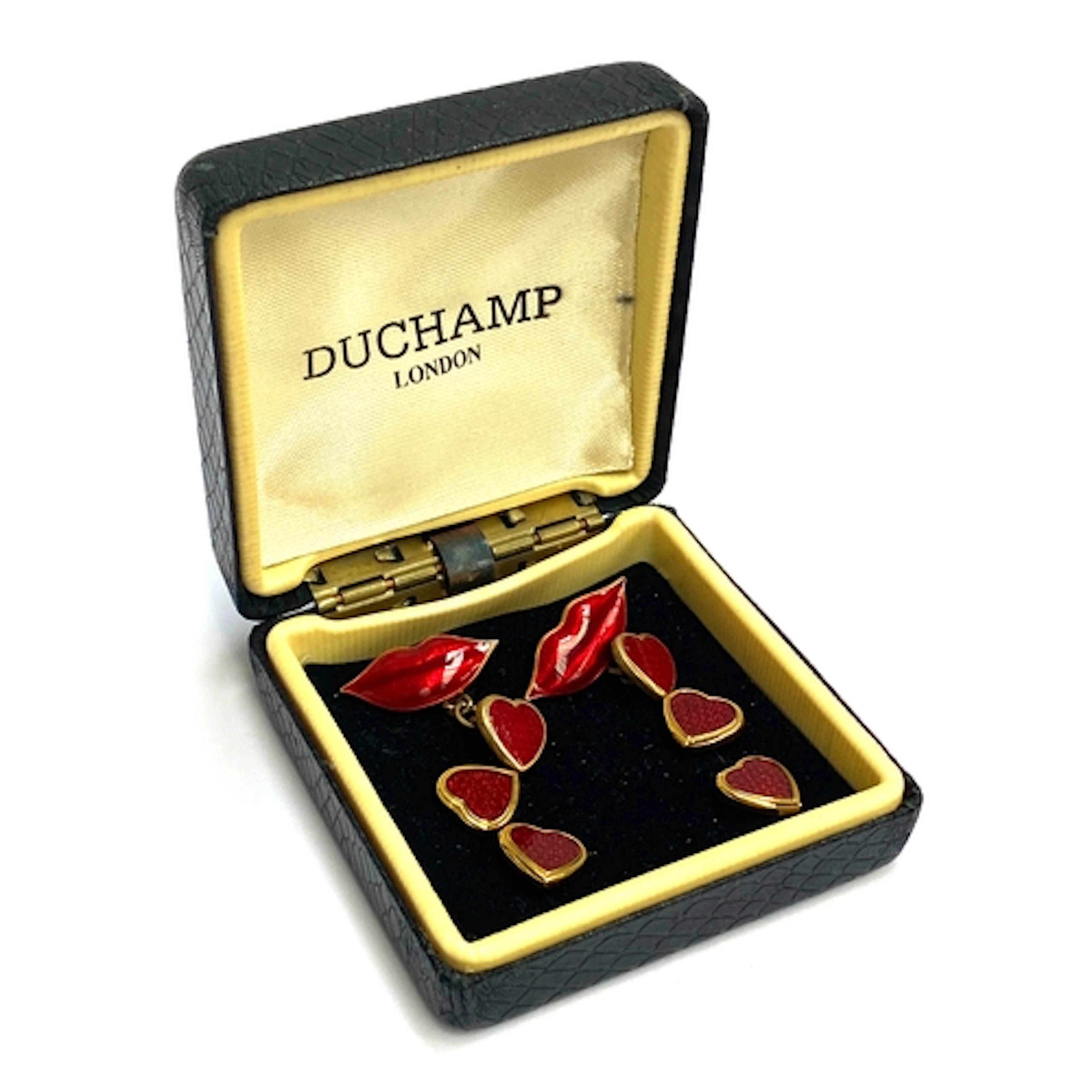 A boxed set of Duchamp silver gilt and guilloche enamel cuff...