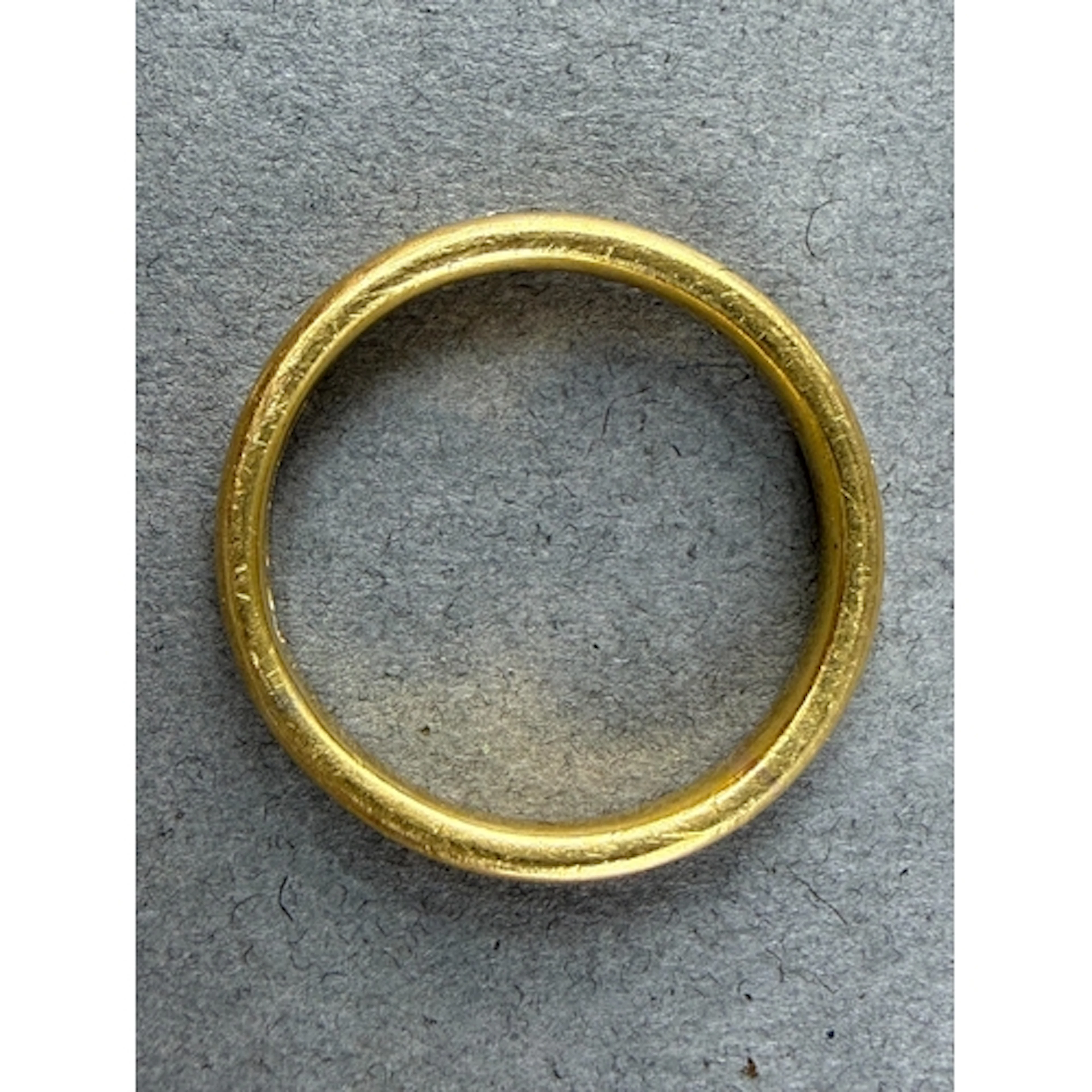 Jewellery: a 22ct yellow gold wedding band, Birmingham hallm...