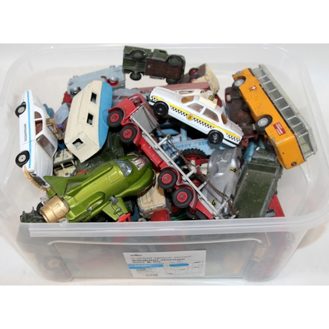 A collection of vintage play worn die-cast model vehicles, D...