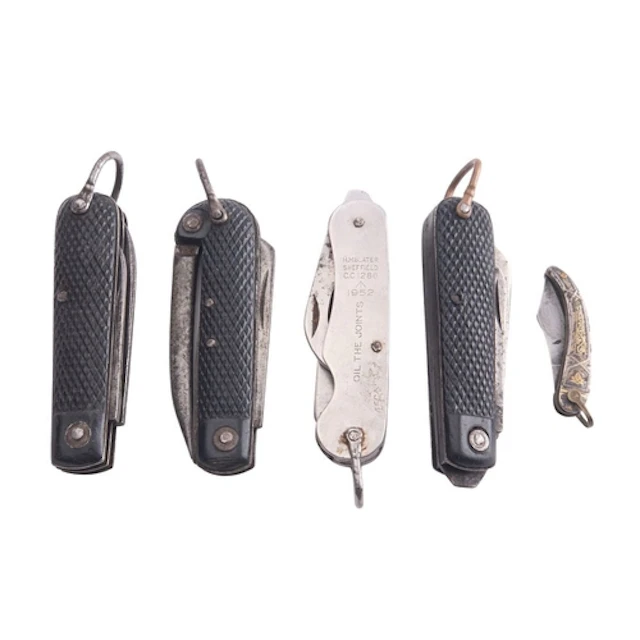A group of four Royal Navy jack knives and a Spanish white a...