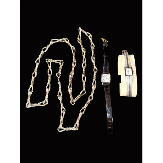 A white metal modernist necklace stamped 925 50gs and two mo...