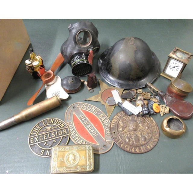 First World War helmet, gas mask, quantity of trench art, qu...