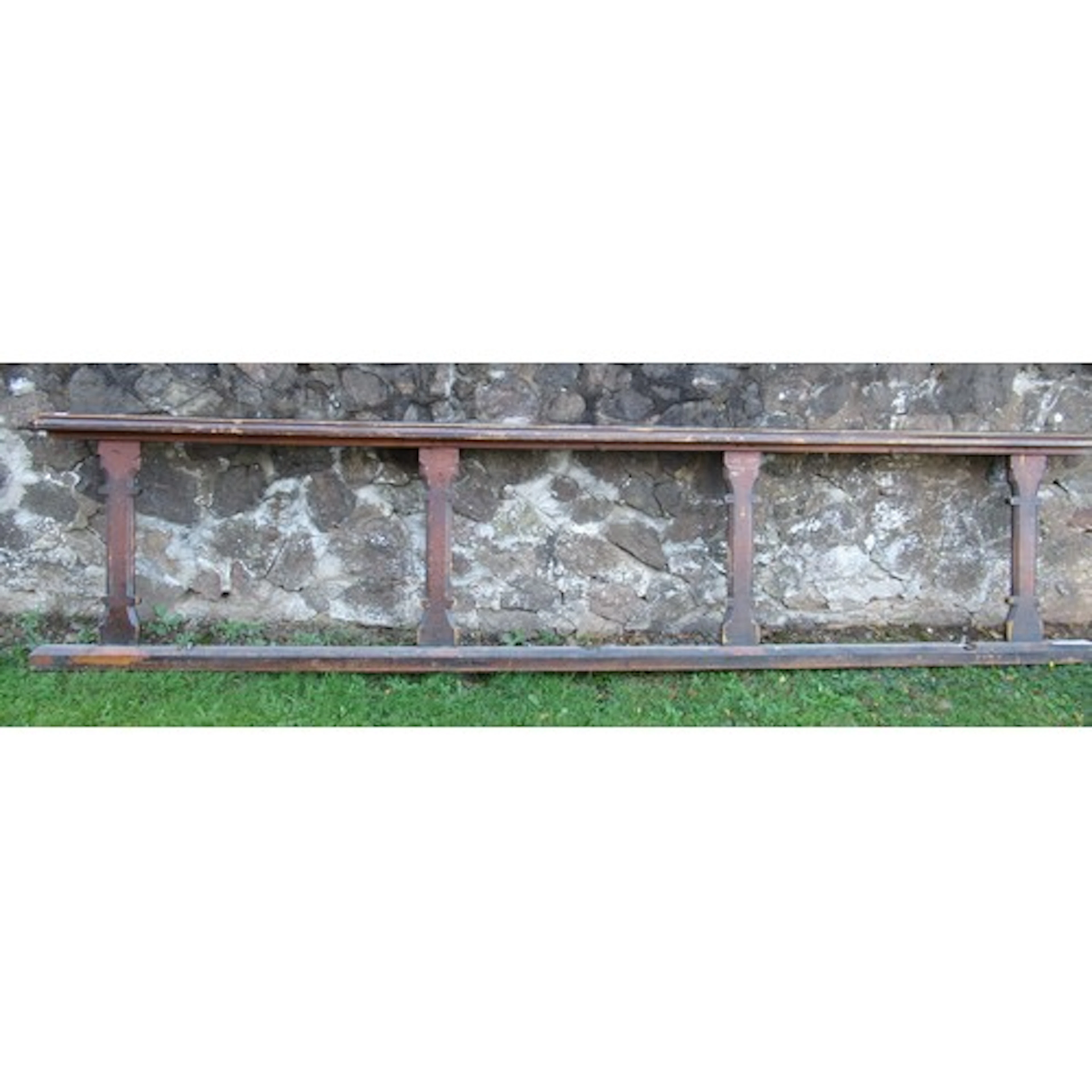 A Victorian carved oak pew front, with Gothic decoration and...