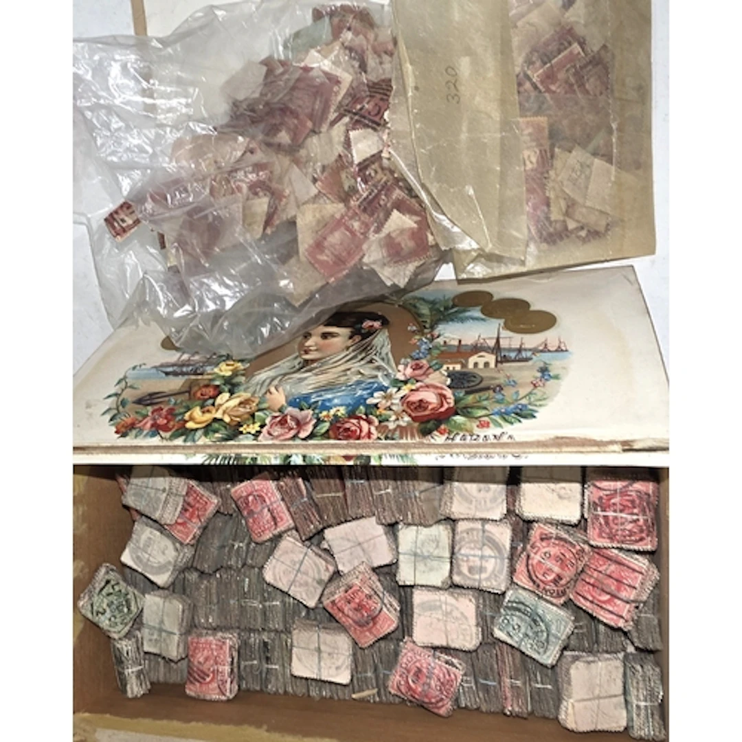 A collection of vintage penny red and other similar stamps.