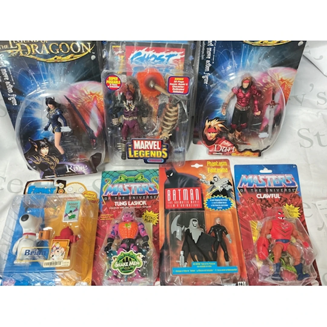 A Collection Of Various Carded Figures Including Masters Of ...
