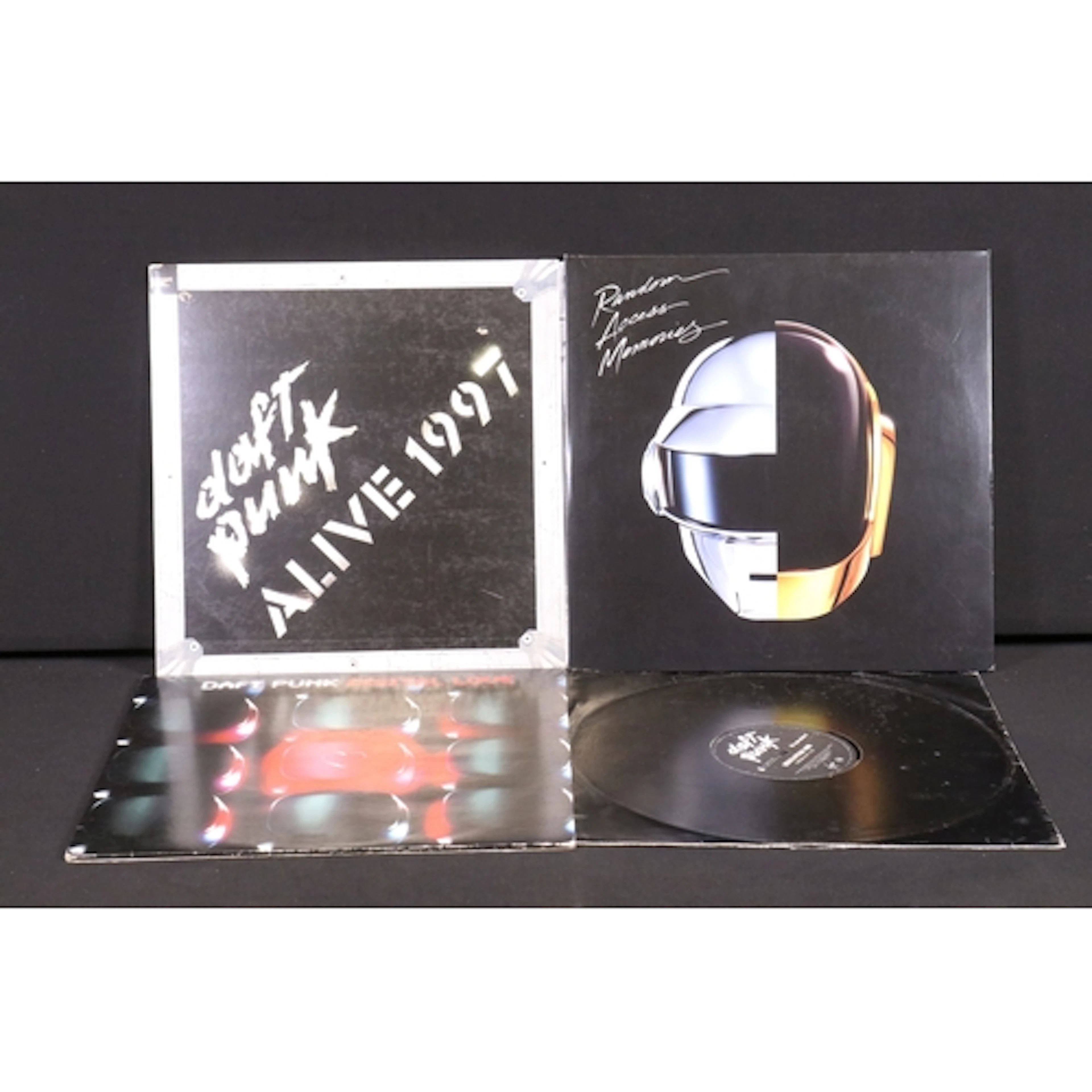 Vinyl - 2 Daft Punk LP’s and 2 x 12” singles to include: Ali...