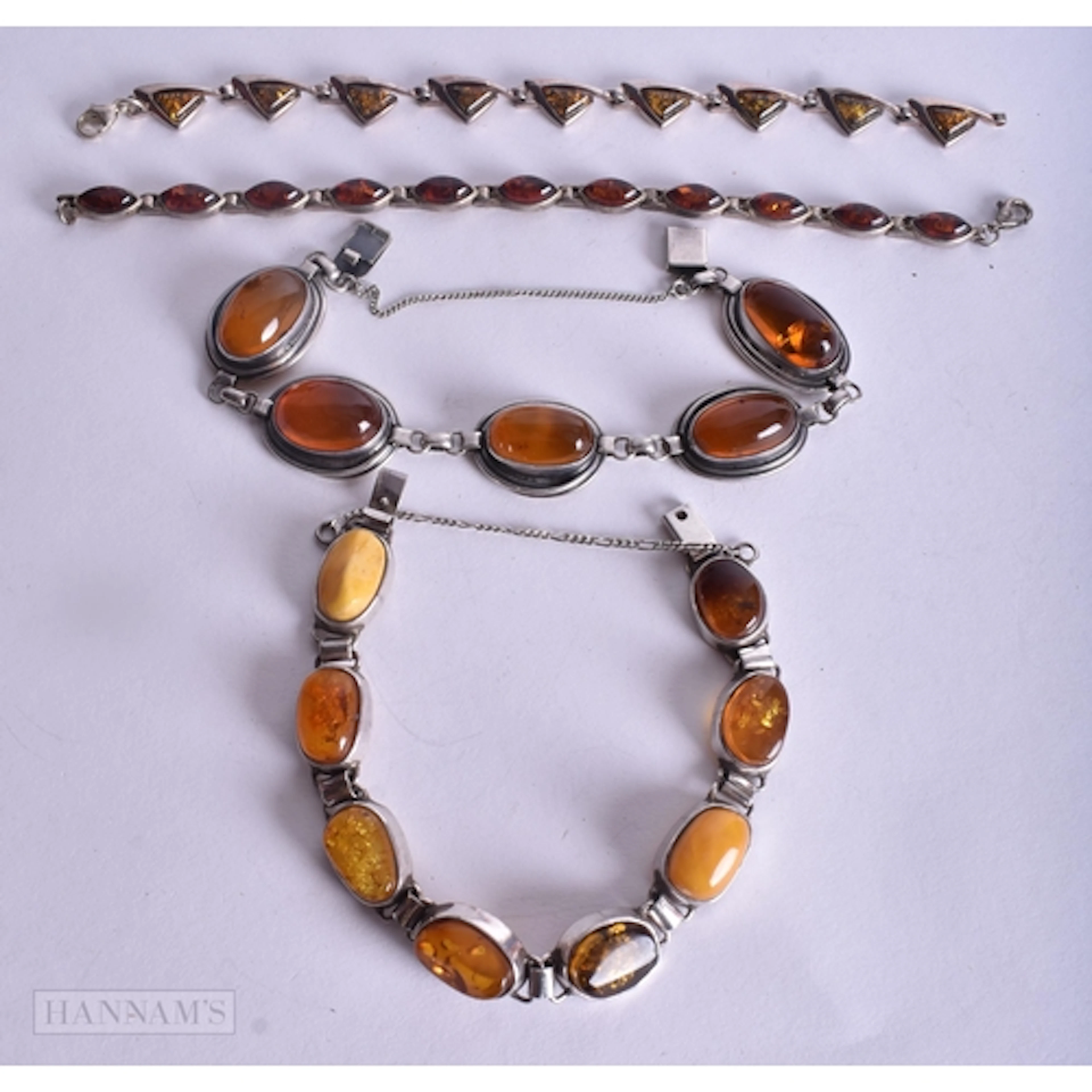 Collection of Sterling Silver Amber Bracelets inc. Baltic, C...