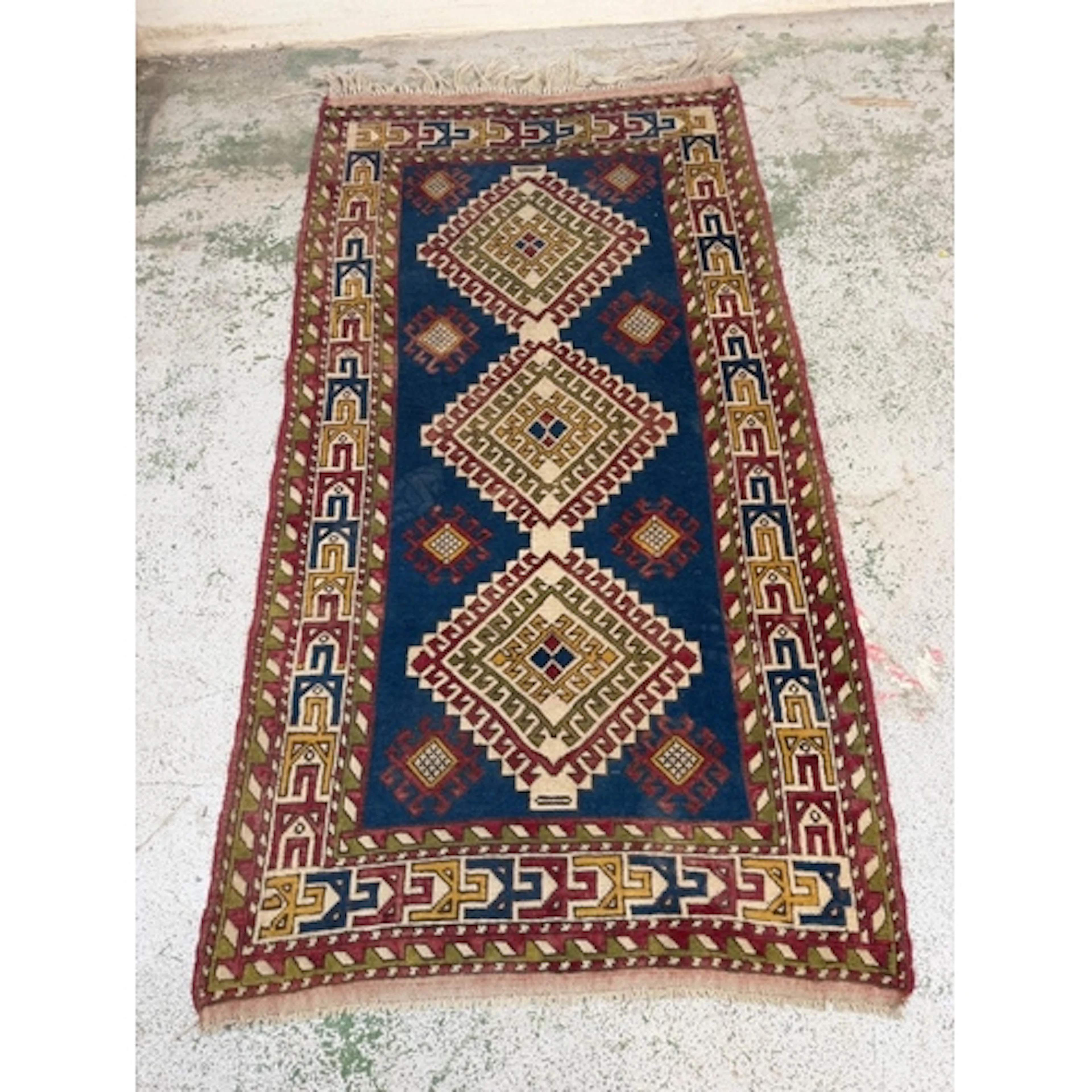 Hand Woven Rug with geometric medallions