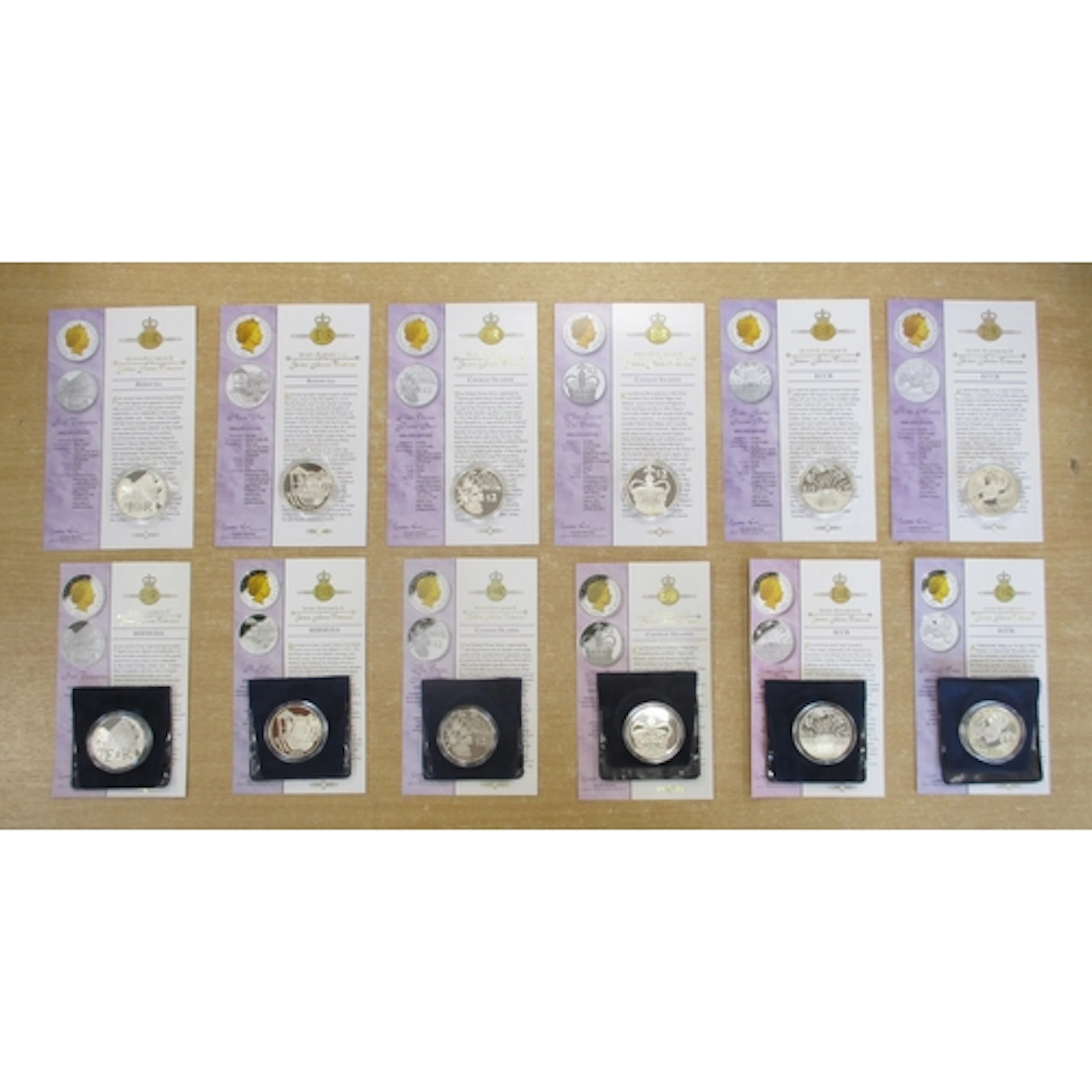 2002 Golden Jubilee collection of silver proof FDC issues in...