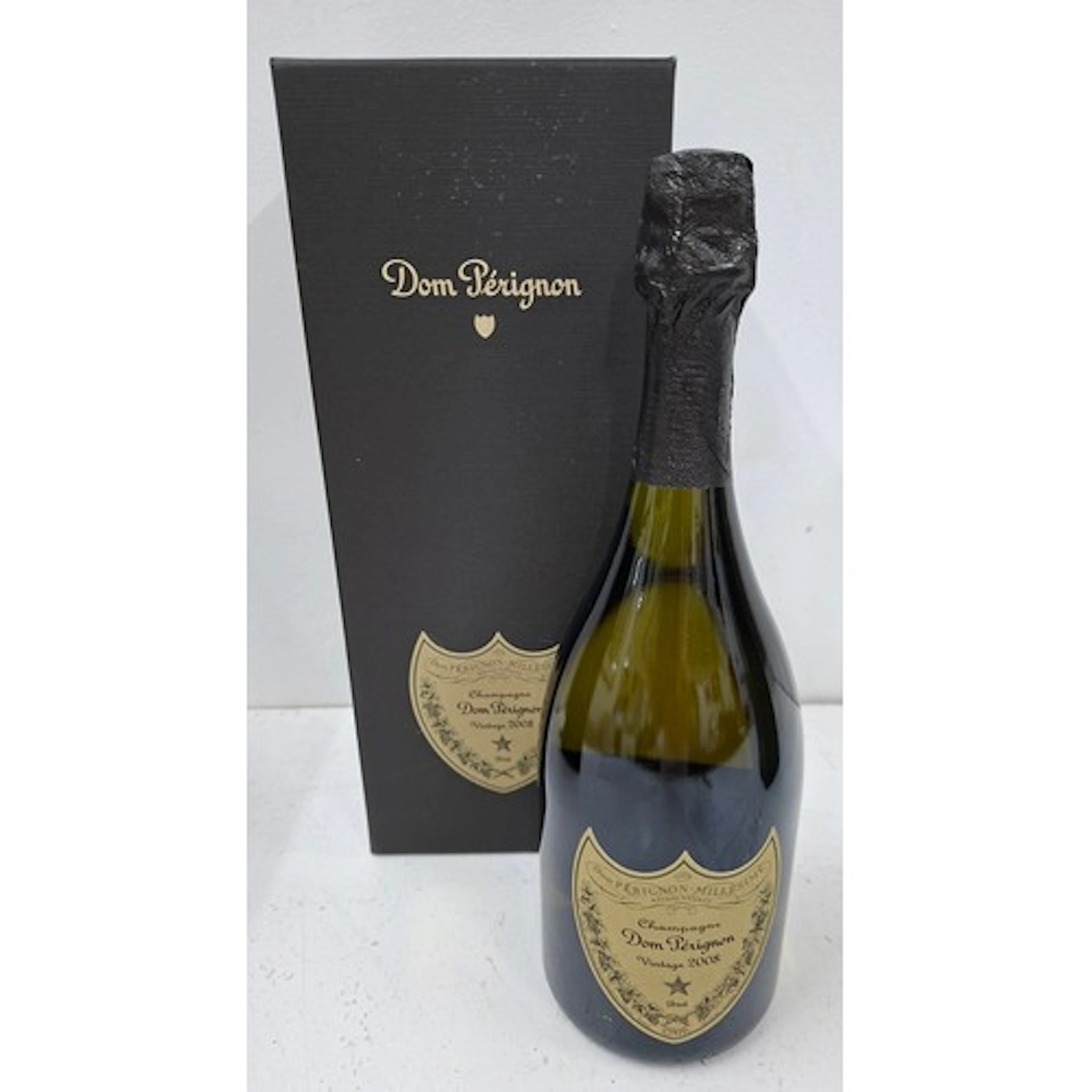 A single boxed bottle of 2008 vintage Dom Perignon champagne...
