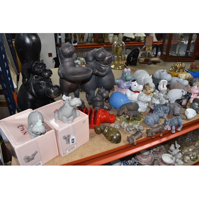 A LARGE COLLECTION OF HIPPOPOTAMUS RELATED ITEMS to include ...