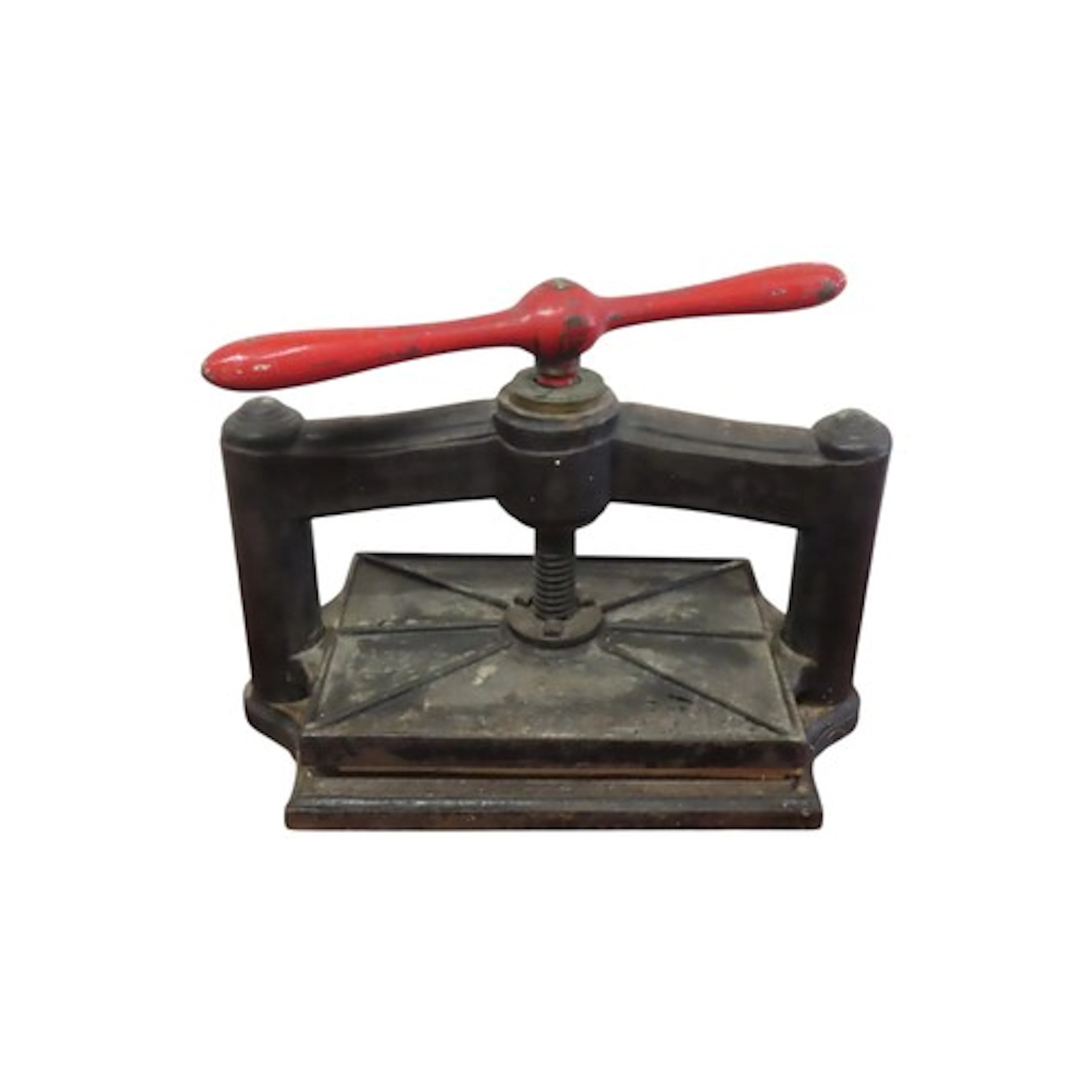 A small but heavy vintage cast iron traditional book press w...
