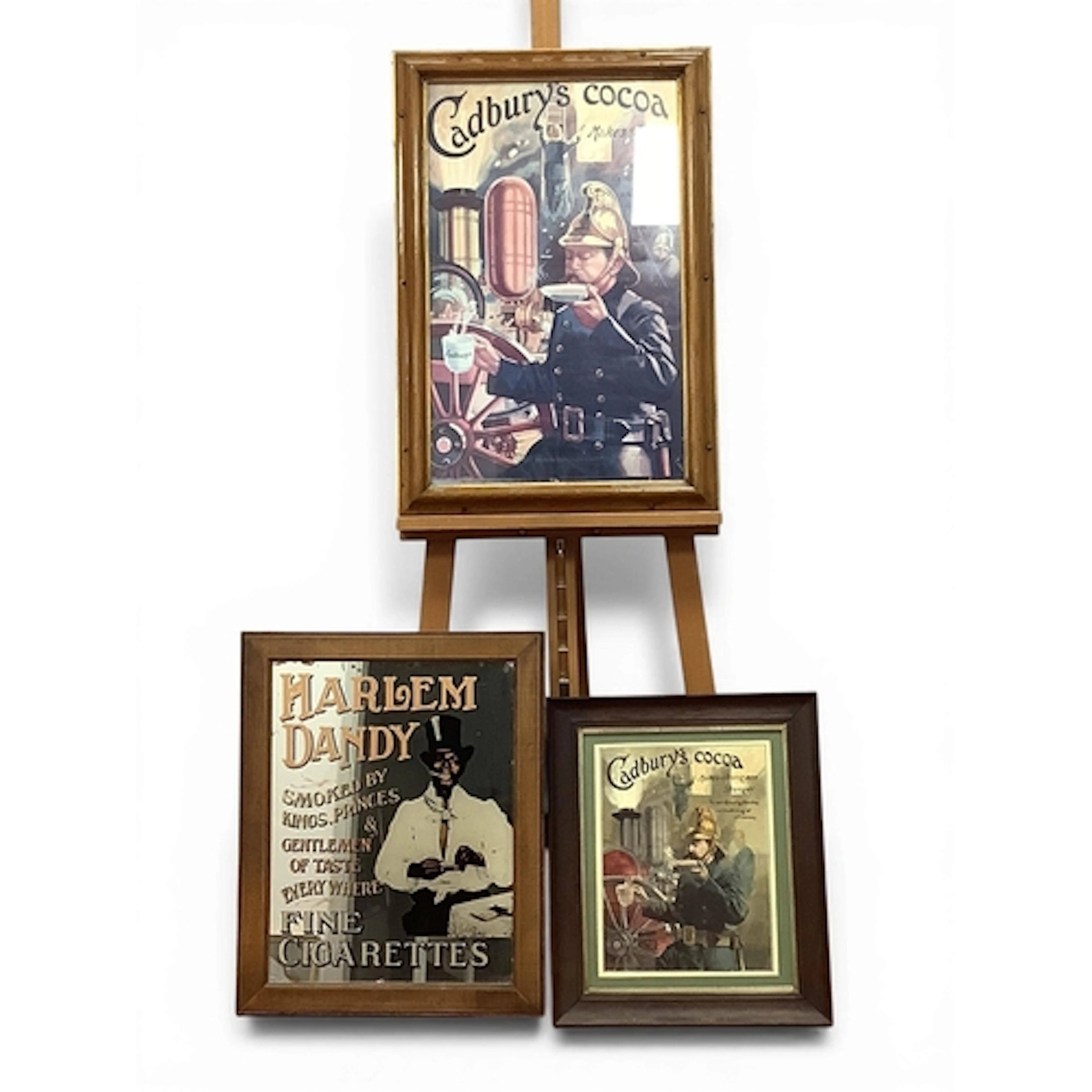 A Vintage 'Cadbury's Cocoa Makes Men Stronger' Print, framed...