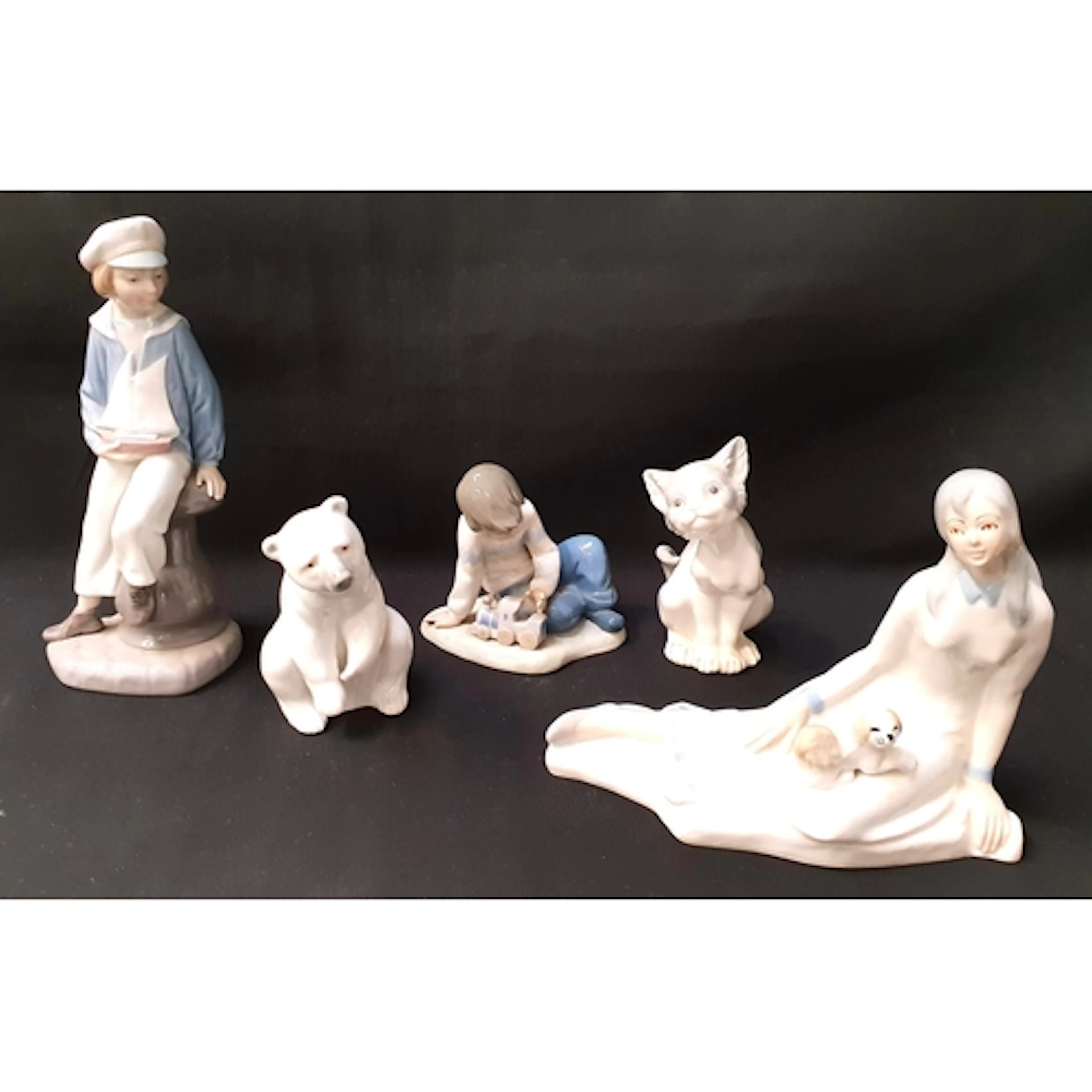 SELECTION OF LLADRO FIGURINES comprising Resting Polar Bear...