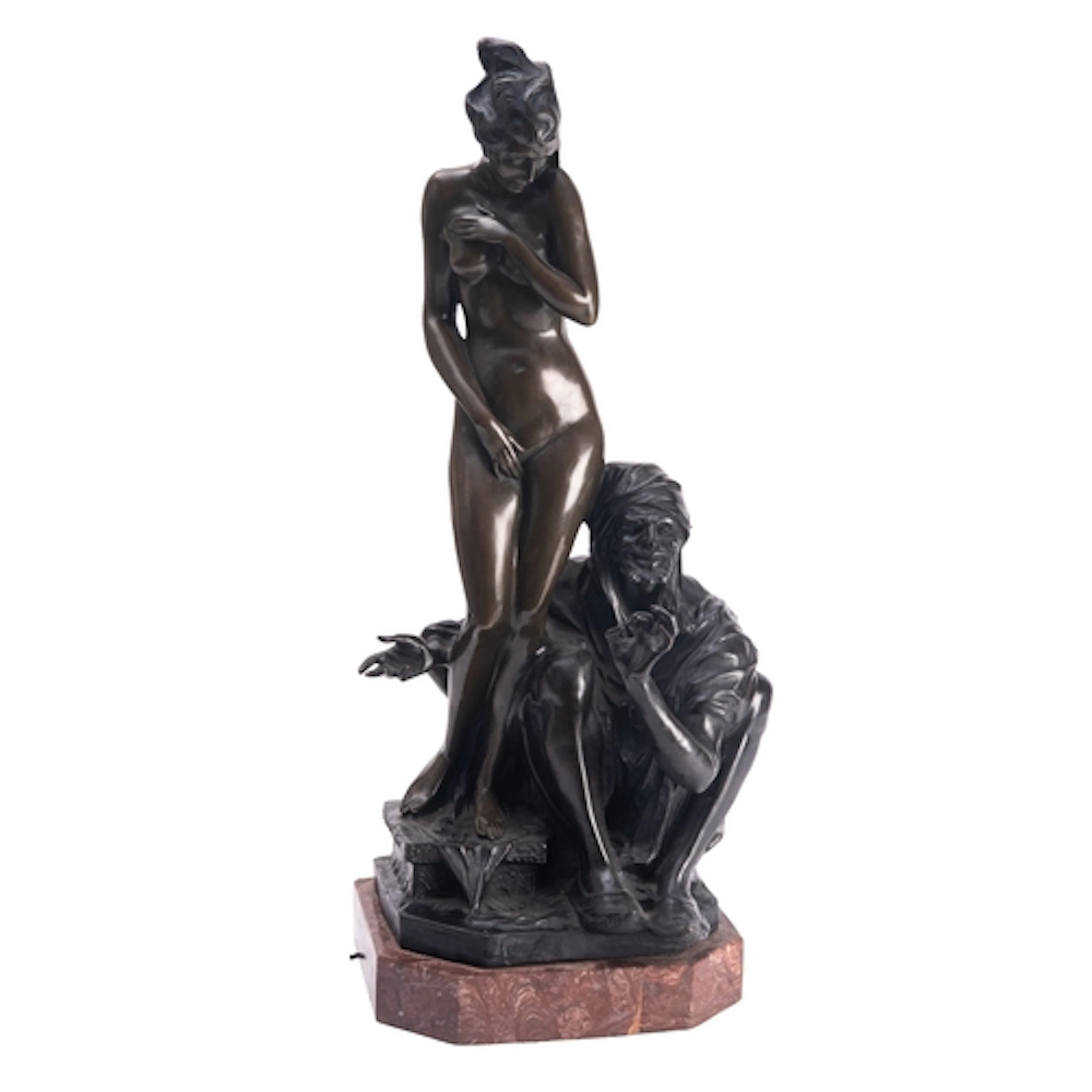 A Continental patinated bronze group of a Moor and a maiden,...