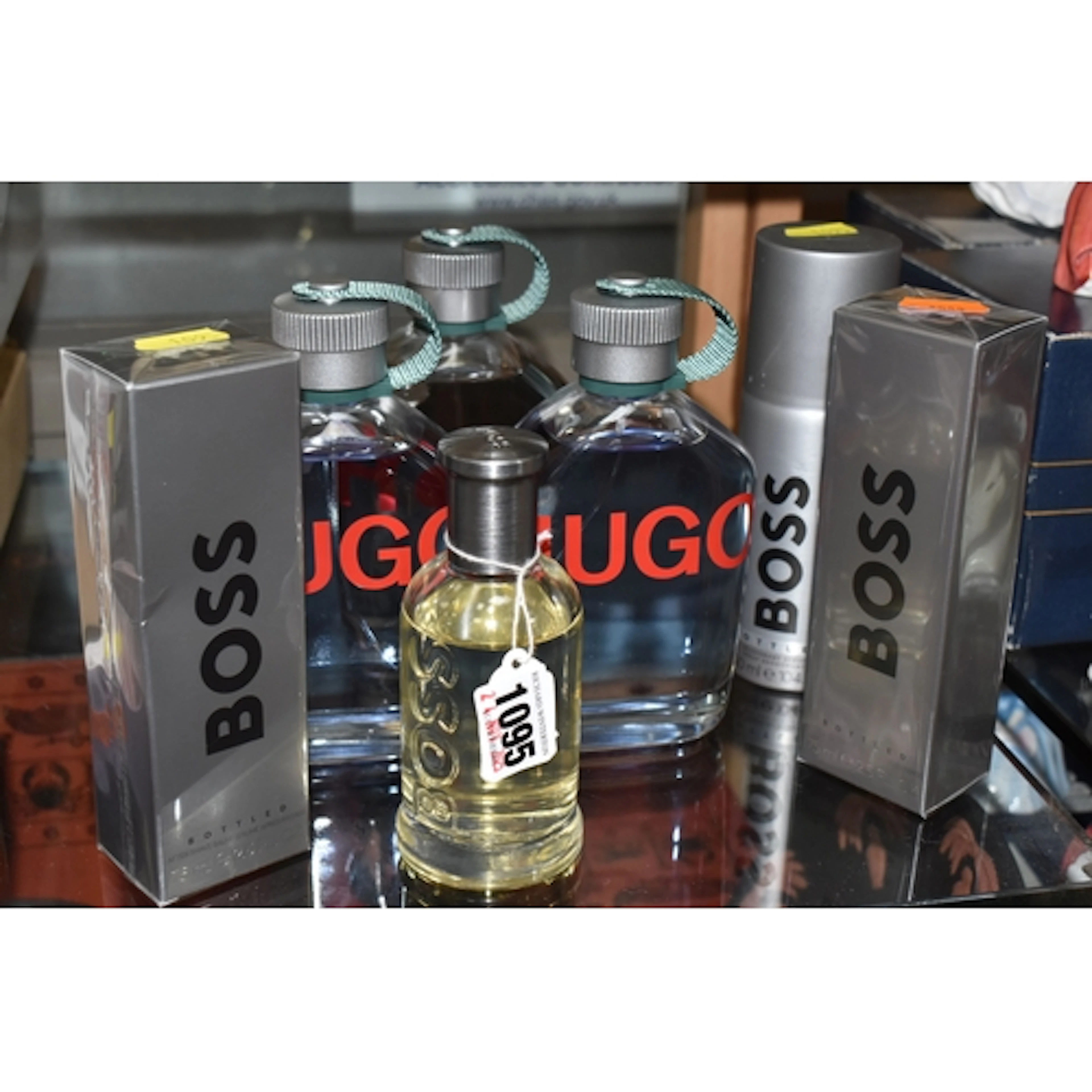 A GROUP OF HUGO BOSS MENS TOLIETRIES, to include three 200ml...