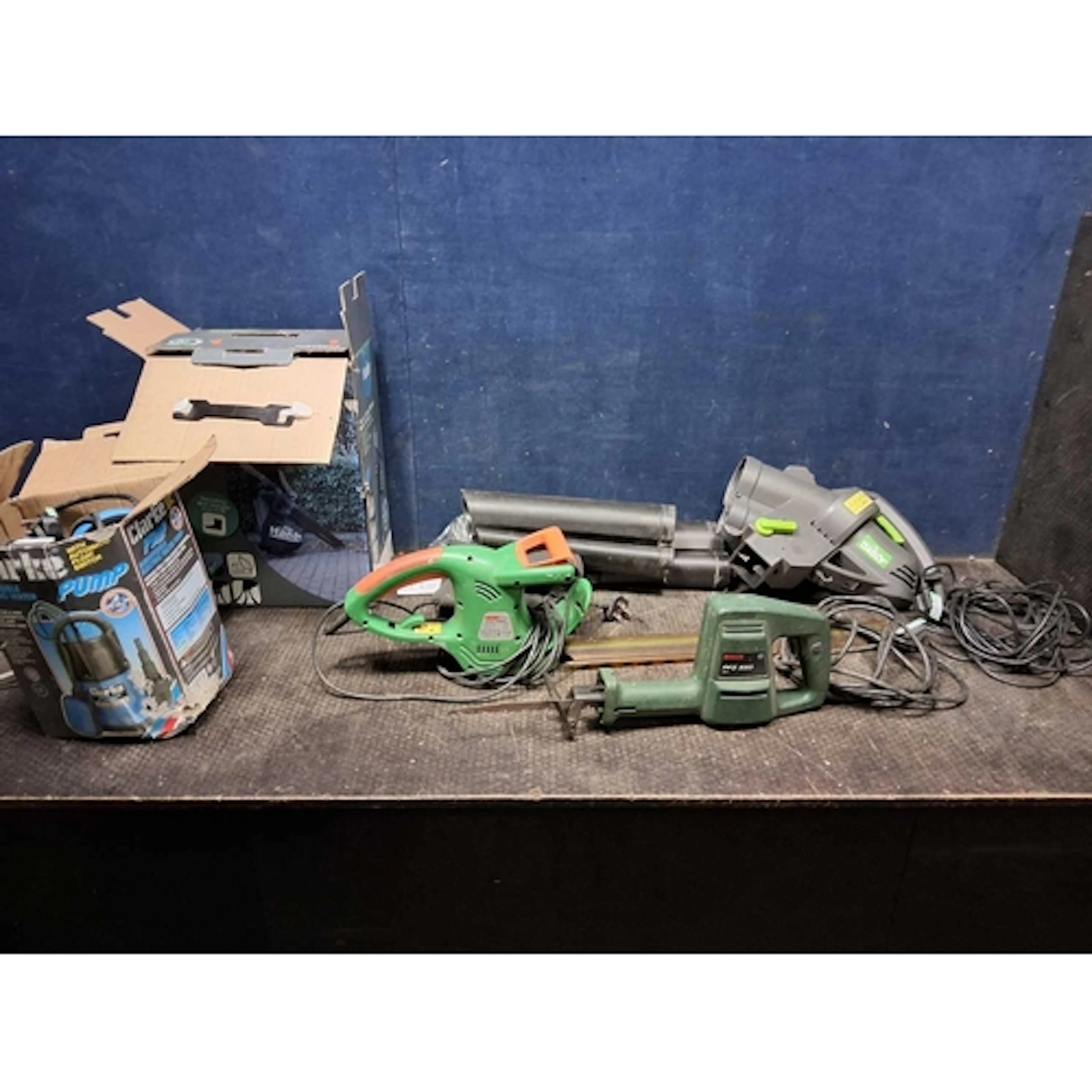 A COLLECTION OF GARDEN POWER TOOLS including a boxed 'The Ha...