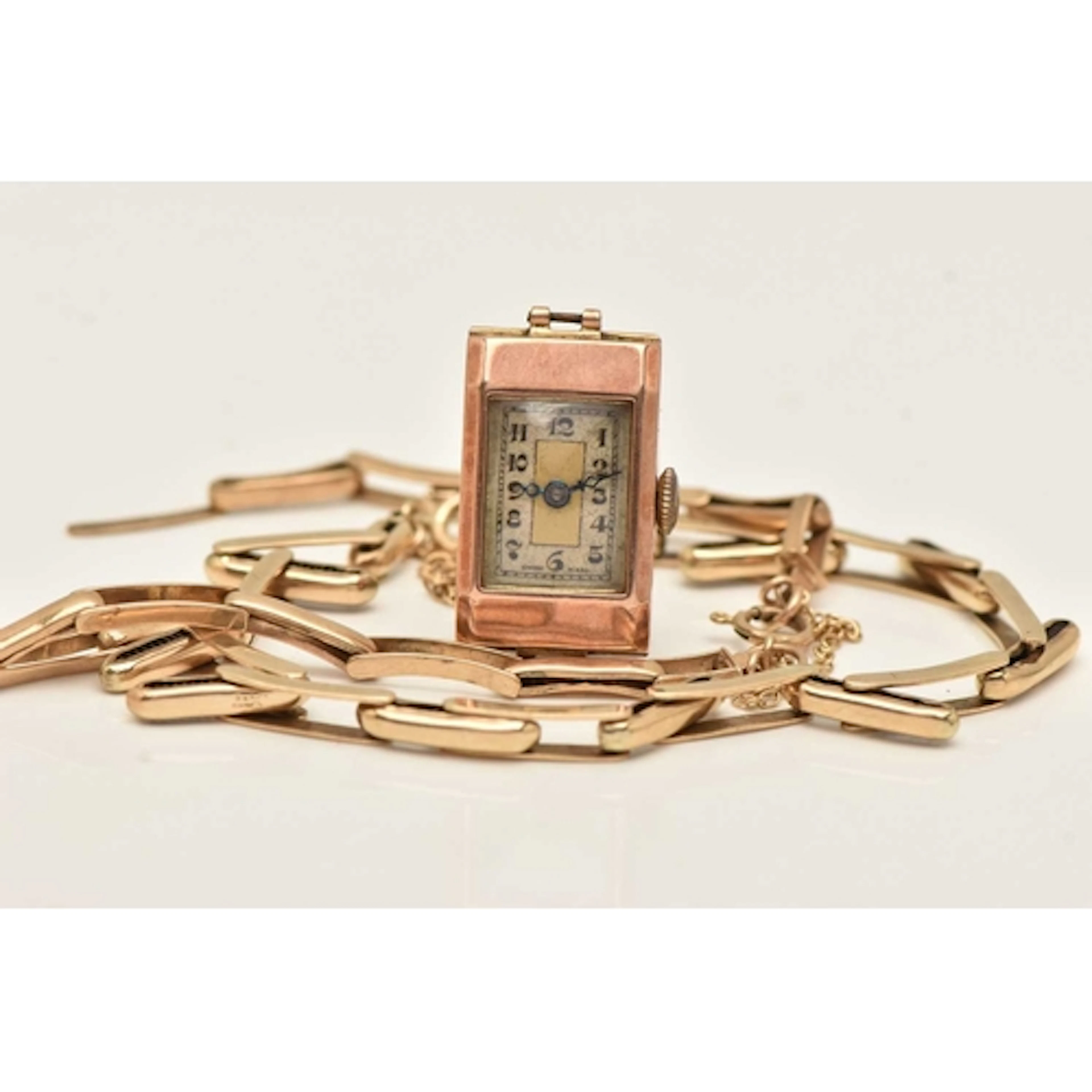 A 1930s 9CT GOLD WRISTWATCH AND TWO YELLOW METAL EXPANDABLE ...
