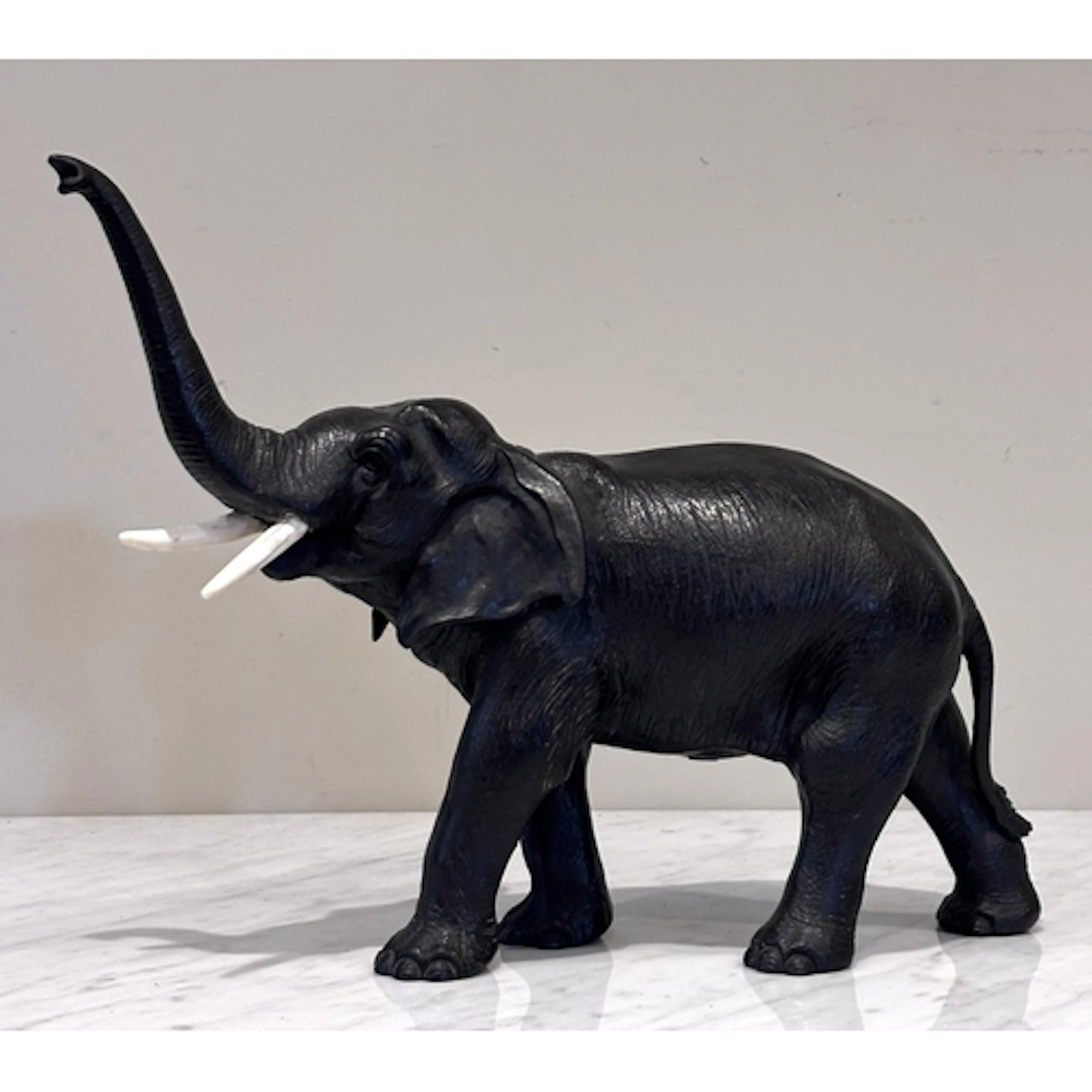 A Japanese cast-bronze model of an elephant, Meiji Period, n...