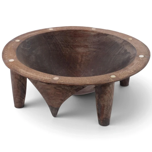A Fijian Kava bowl on 4 legs, carved from a single piece of ...