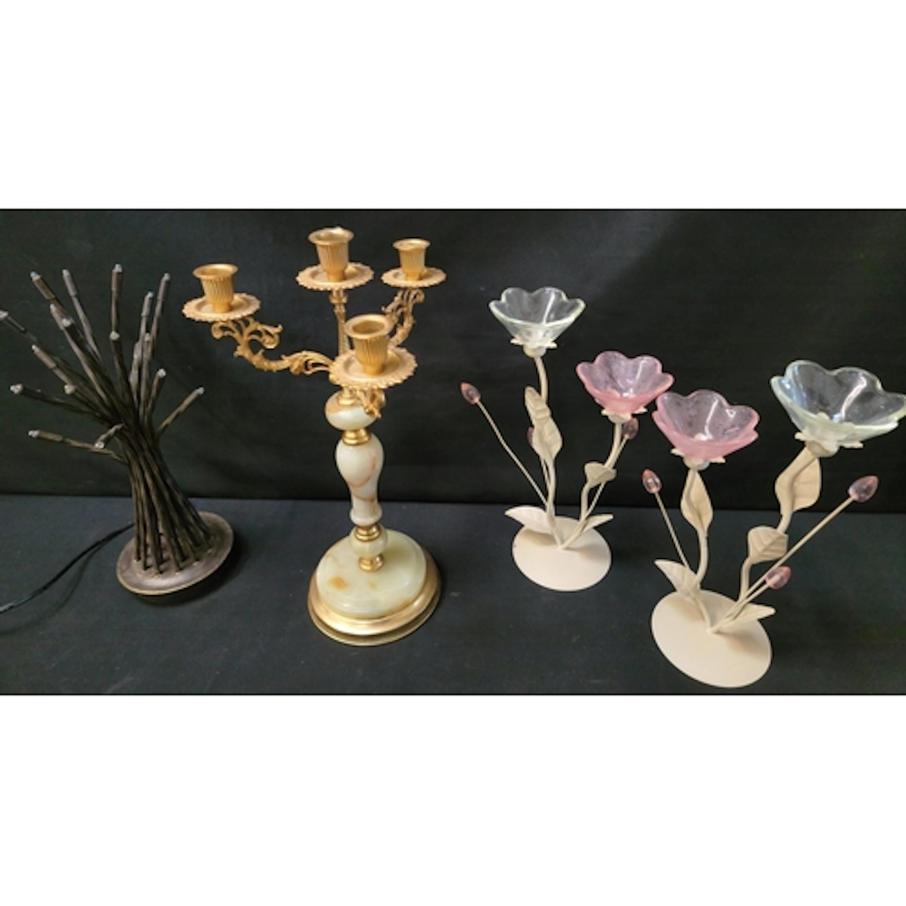 GILT METAL AND ONYX CANDELABRA the three candle holders on ...