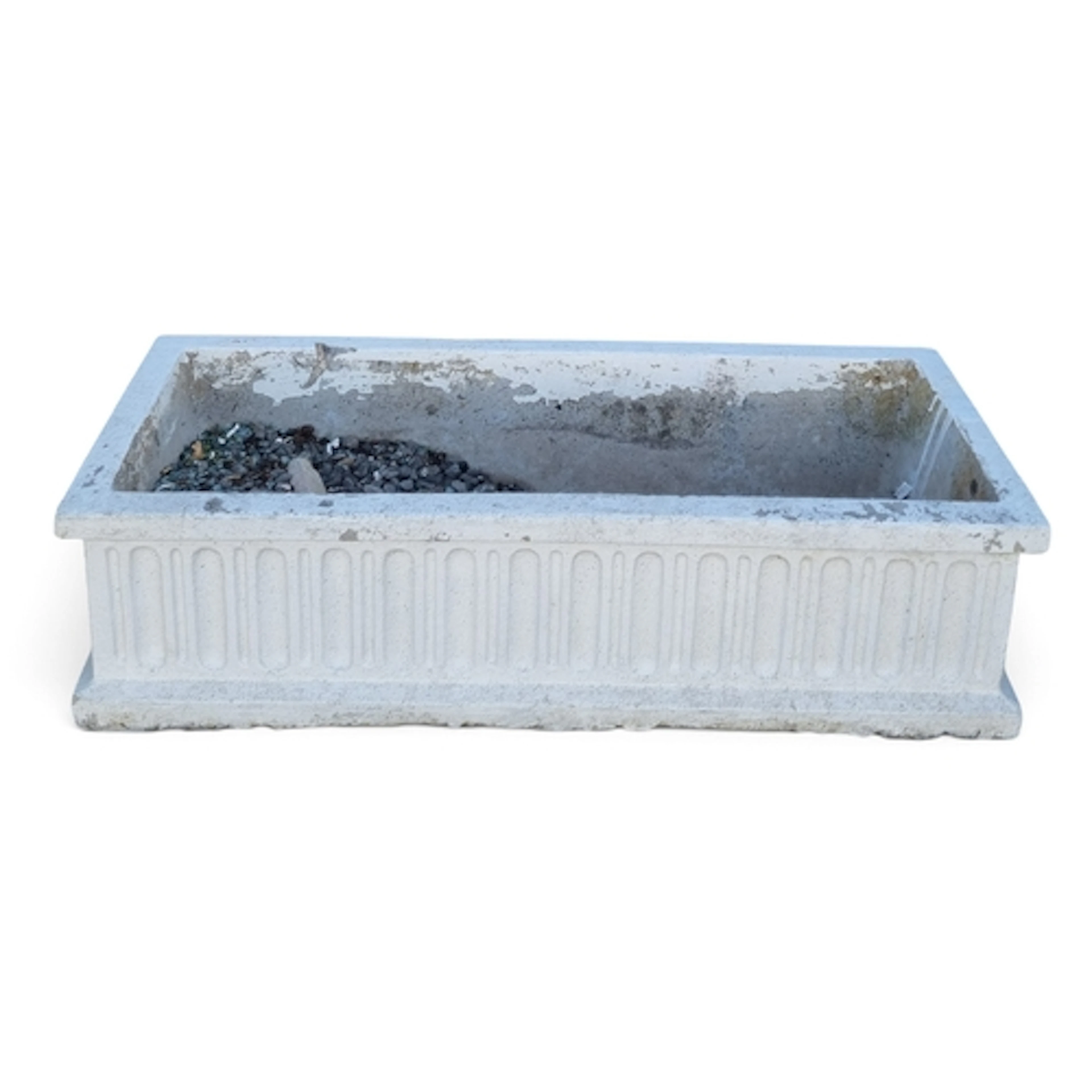 A long and narrow reconstituted Stone Planter with a fluted ...