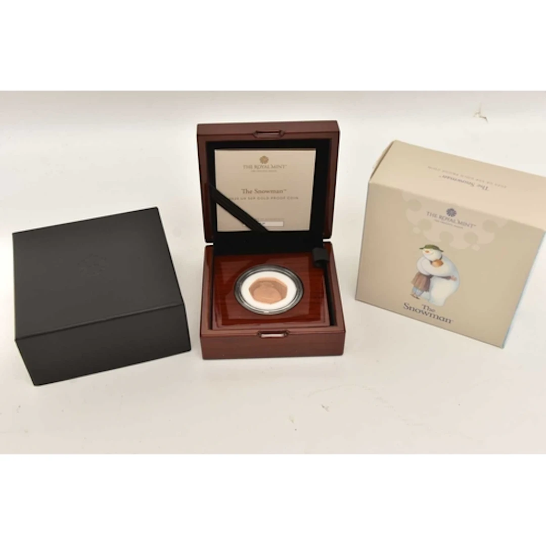 A BOXED ROYAL MINT, THE SNOWMAN 2020 UK 50P GOLD PROOF COIN,...