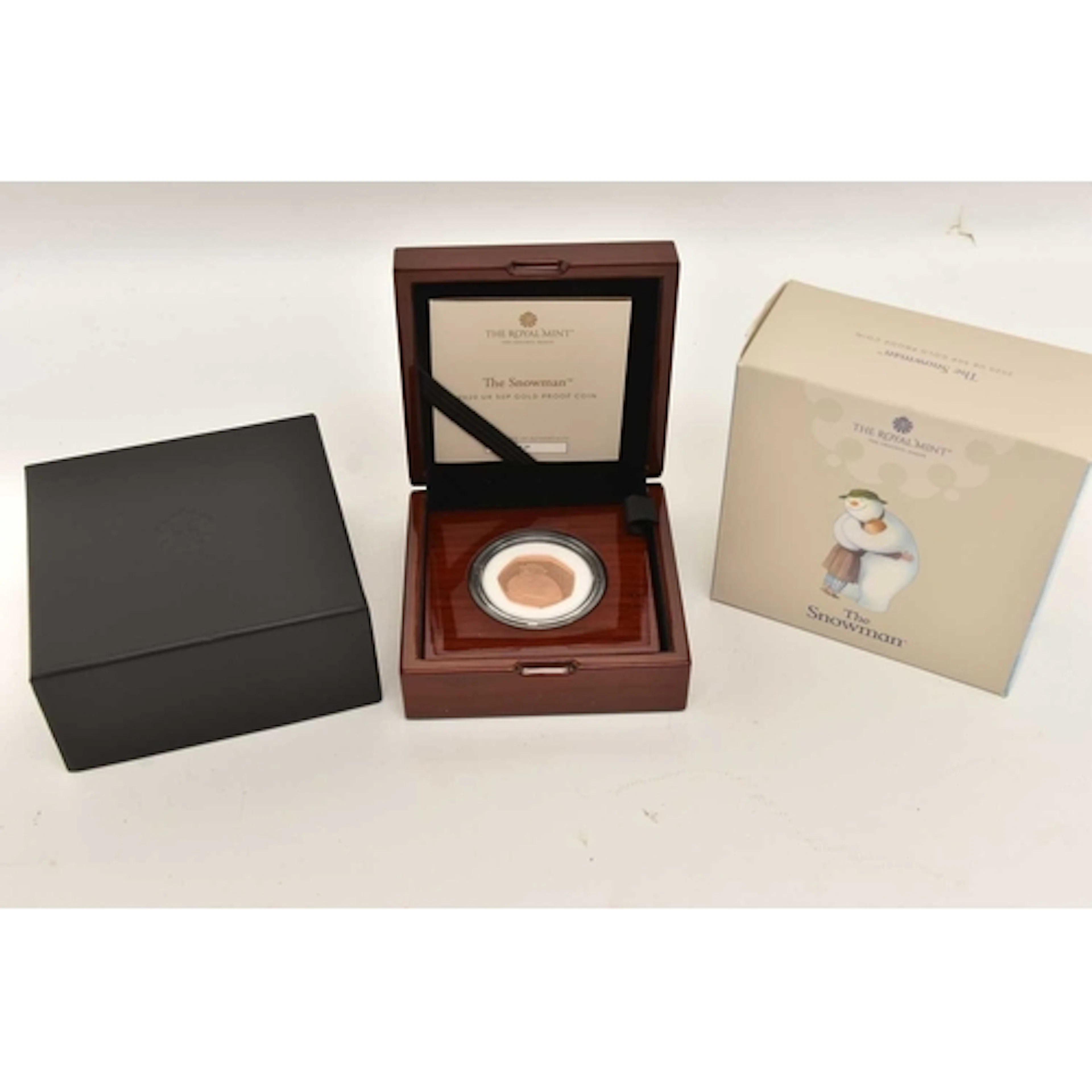 A BOXED ROYAL MINT, THE SNOWMAN 2020 UK 50P GOLD PROOF COIN,...
