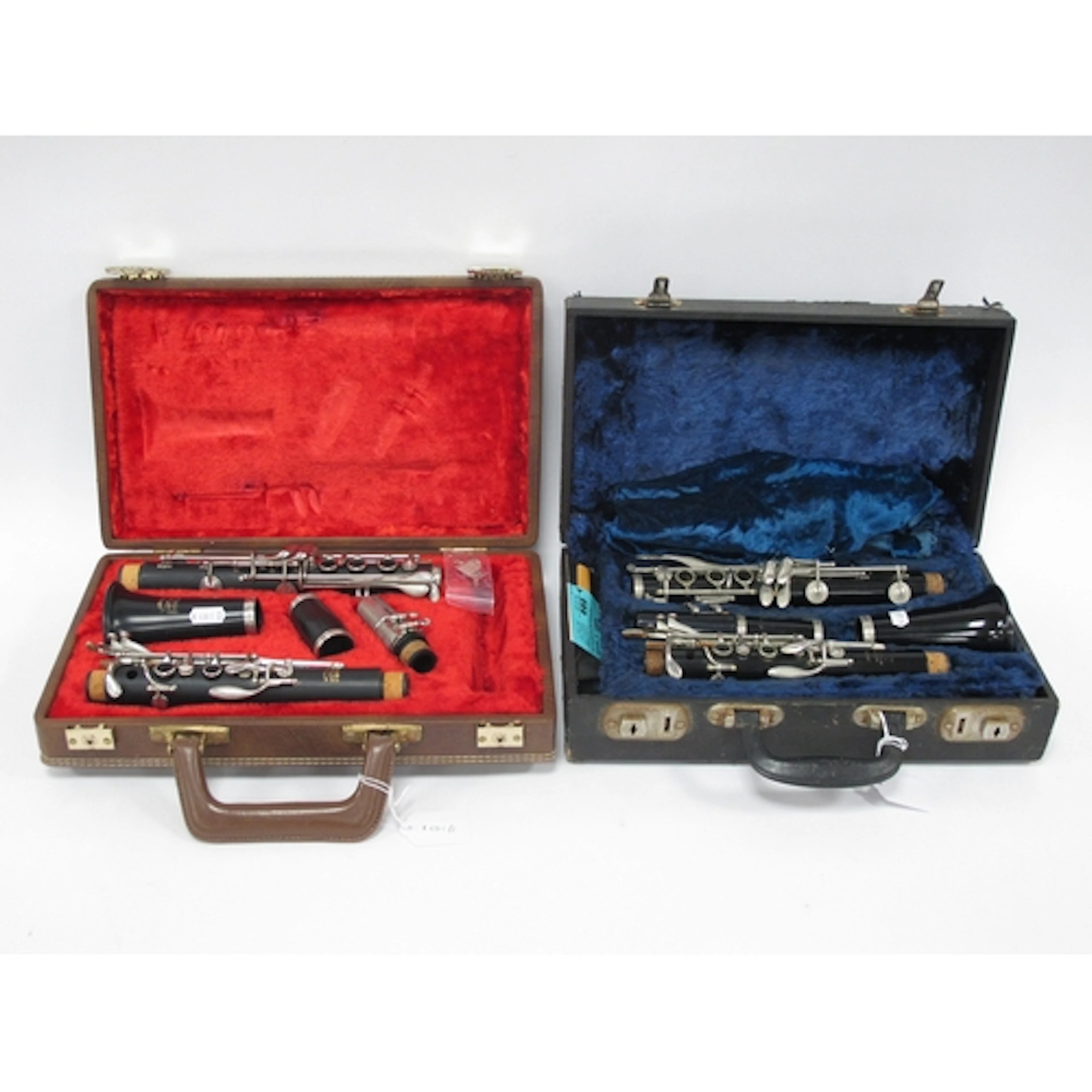 Two vintage Boosey & Hawkes clarinets: black cased "Regent" ...