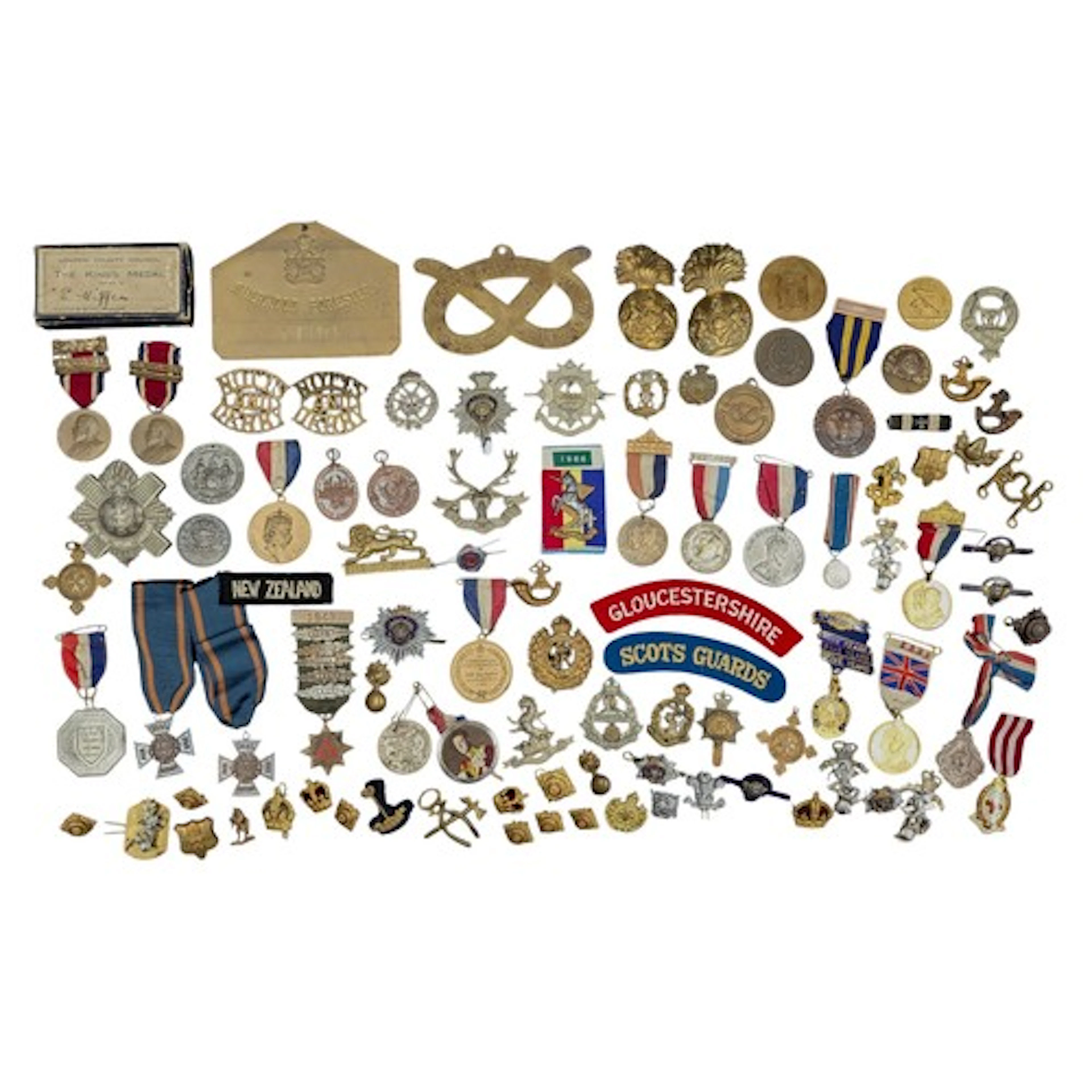 Quantity of British badges, medals & awards to include a WW2...