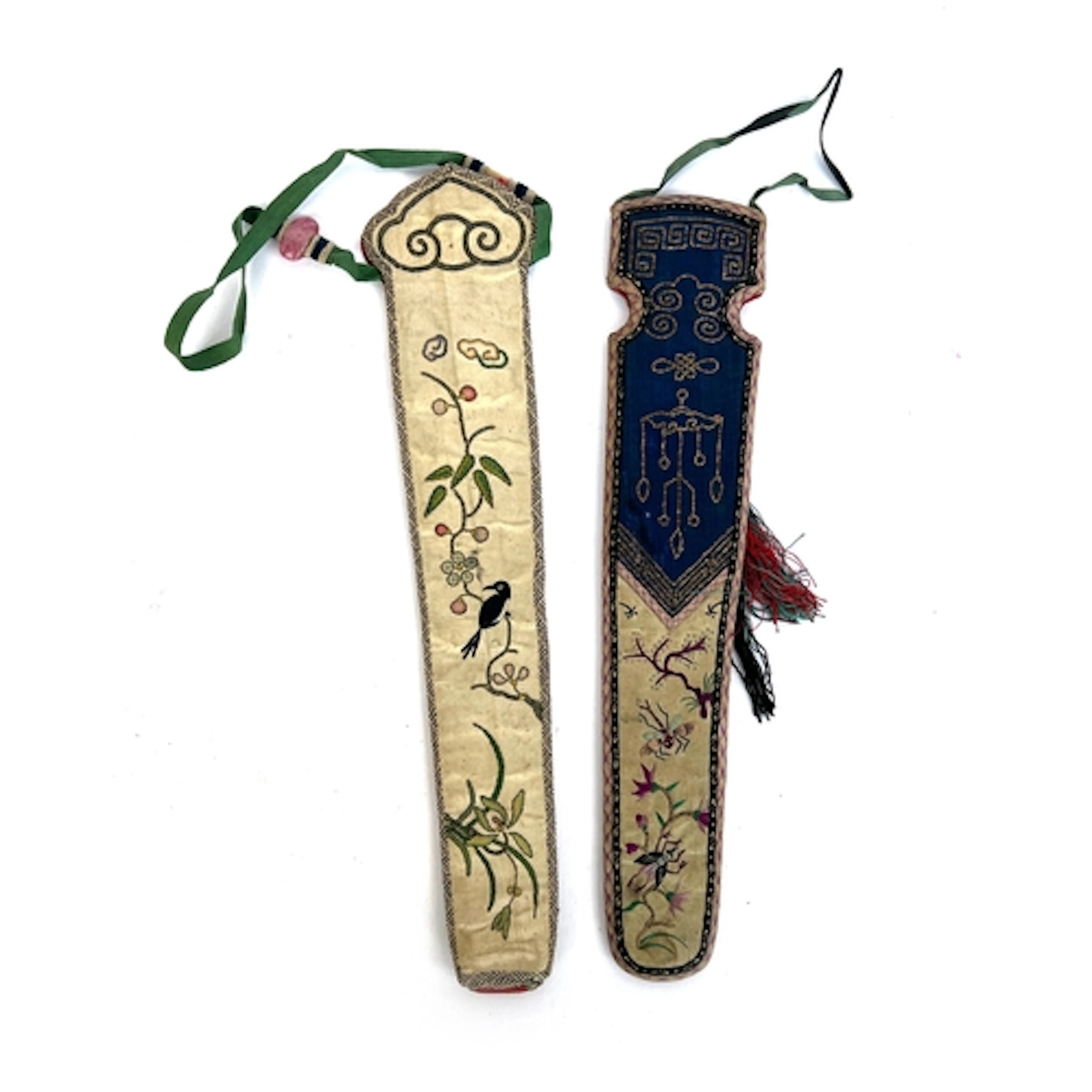Two Chinese antique silk fan cases, one embroidered in peki...