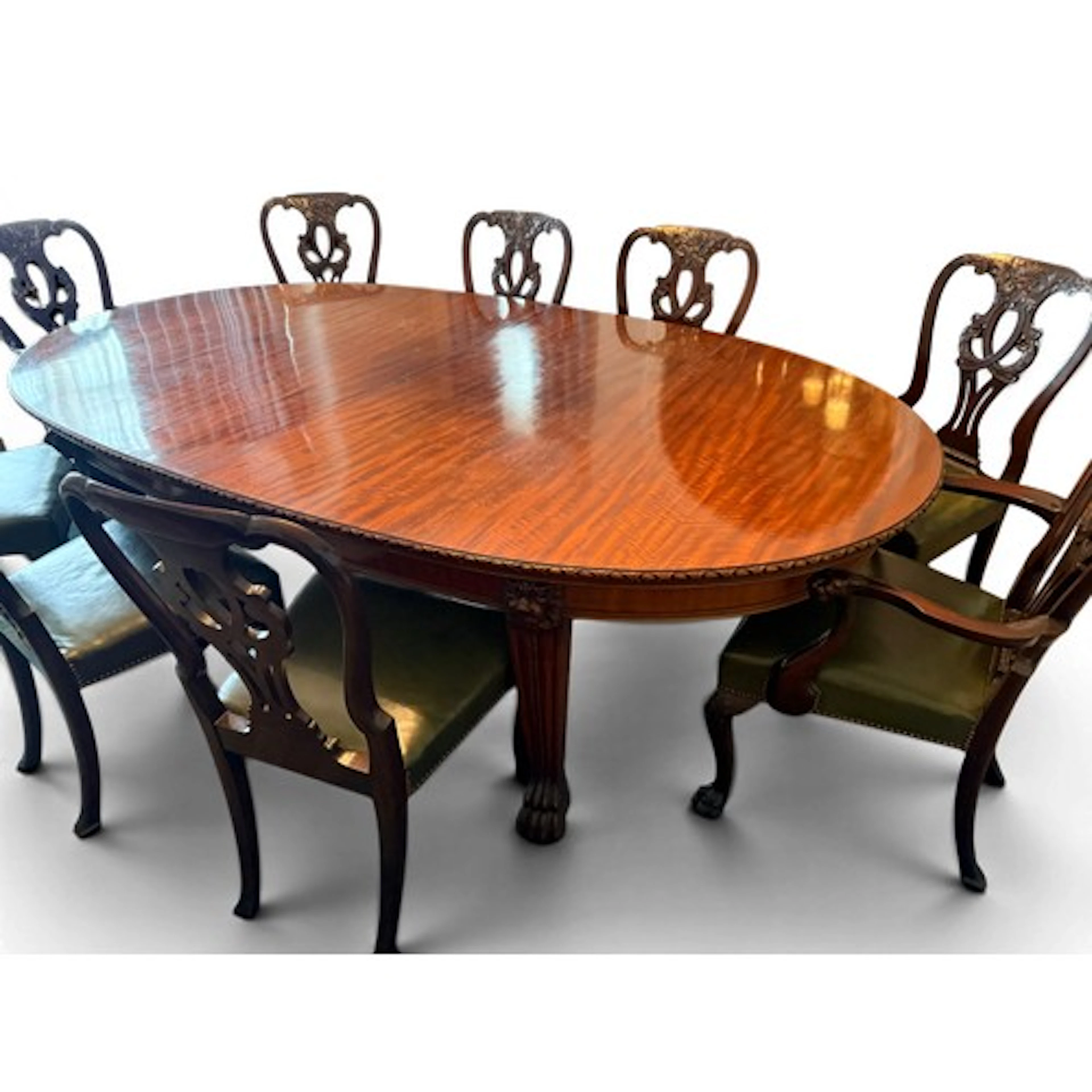 An early 1900’s bespoke mahogany wind out dining table, 12 c...