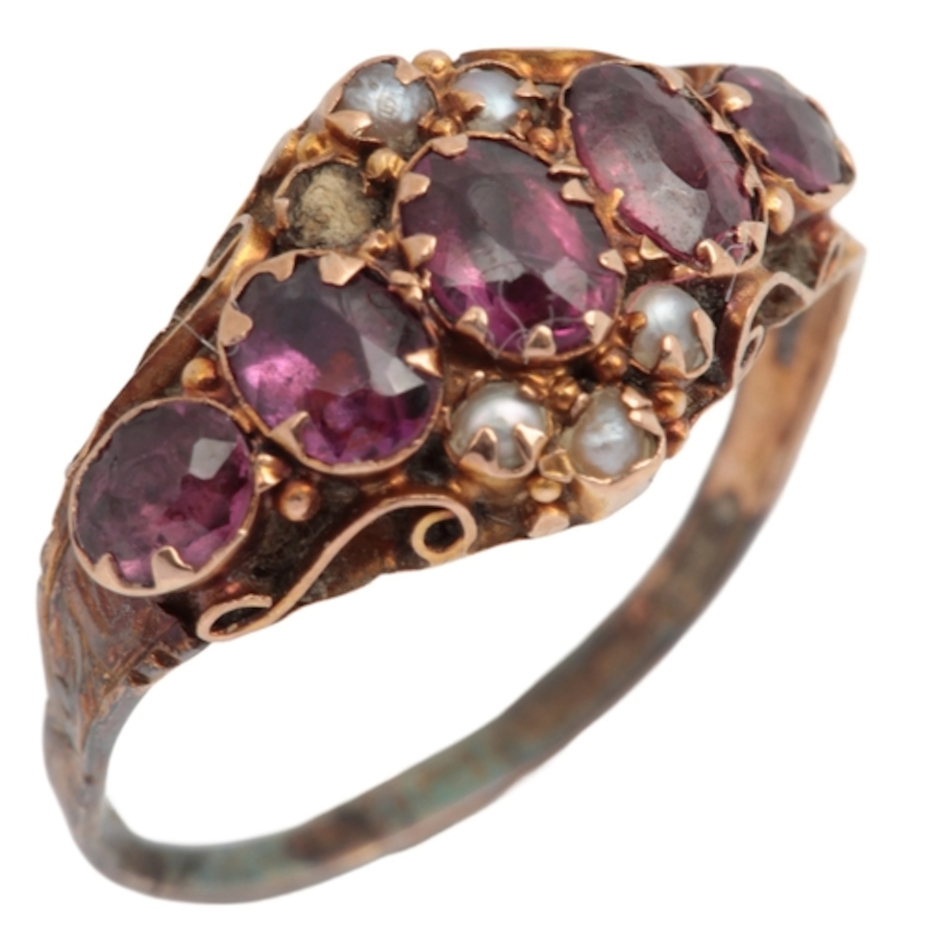 A garnet and seed pearl ring, 19th century, set with five ov...