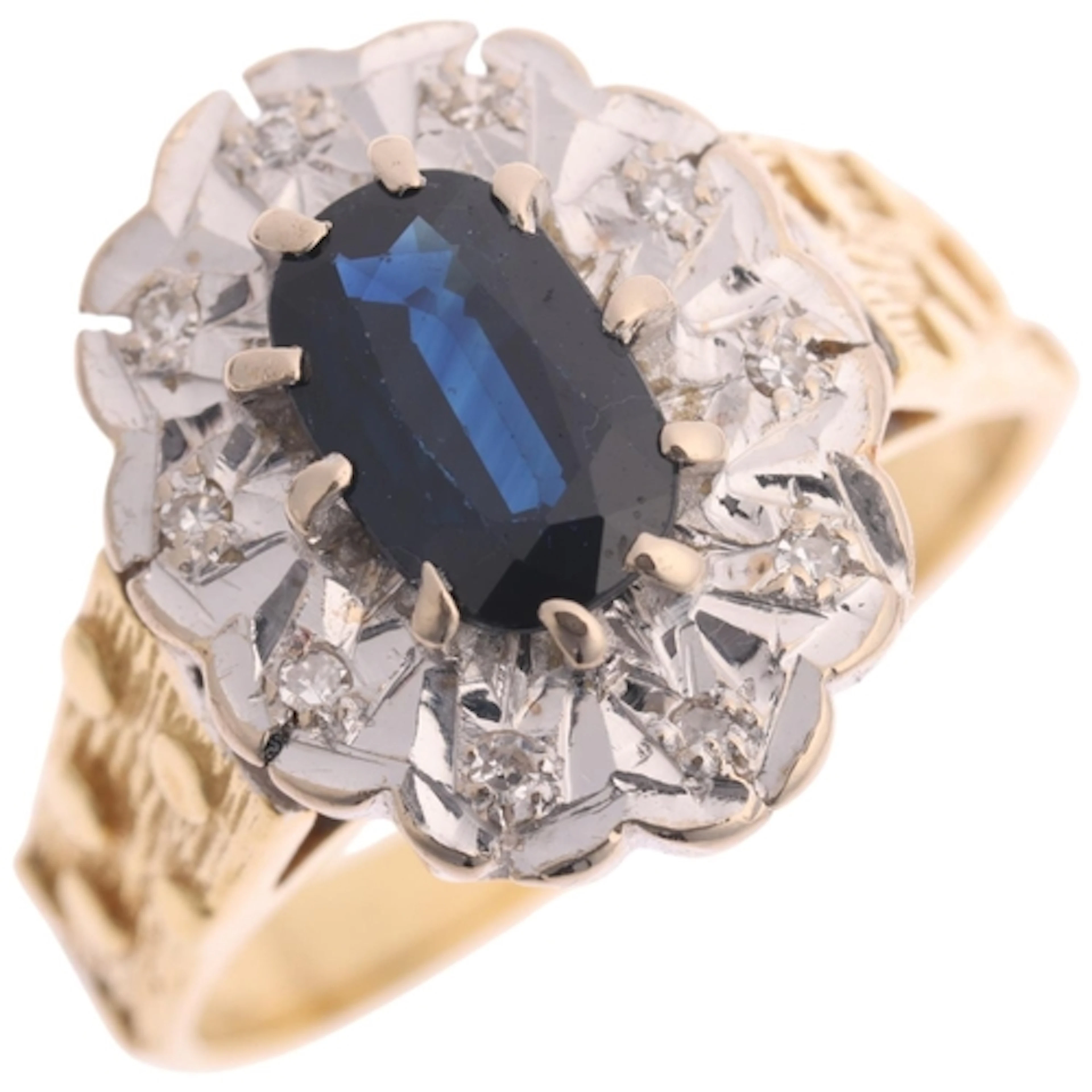An 18ct gold sapphire and diamond cluster ring, London 1979,...