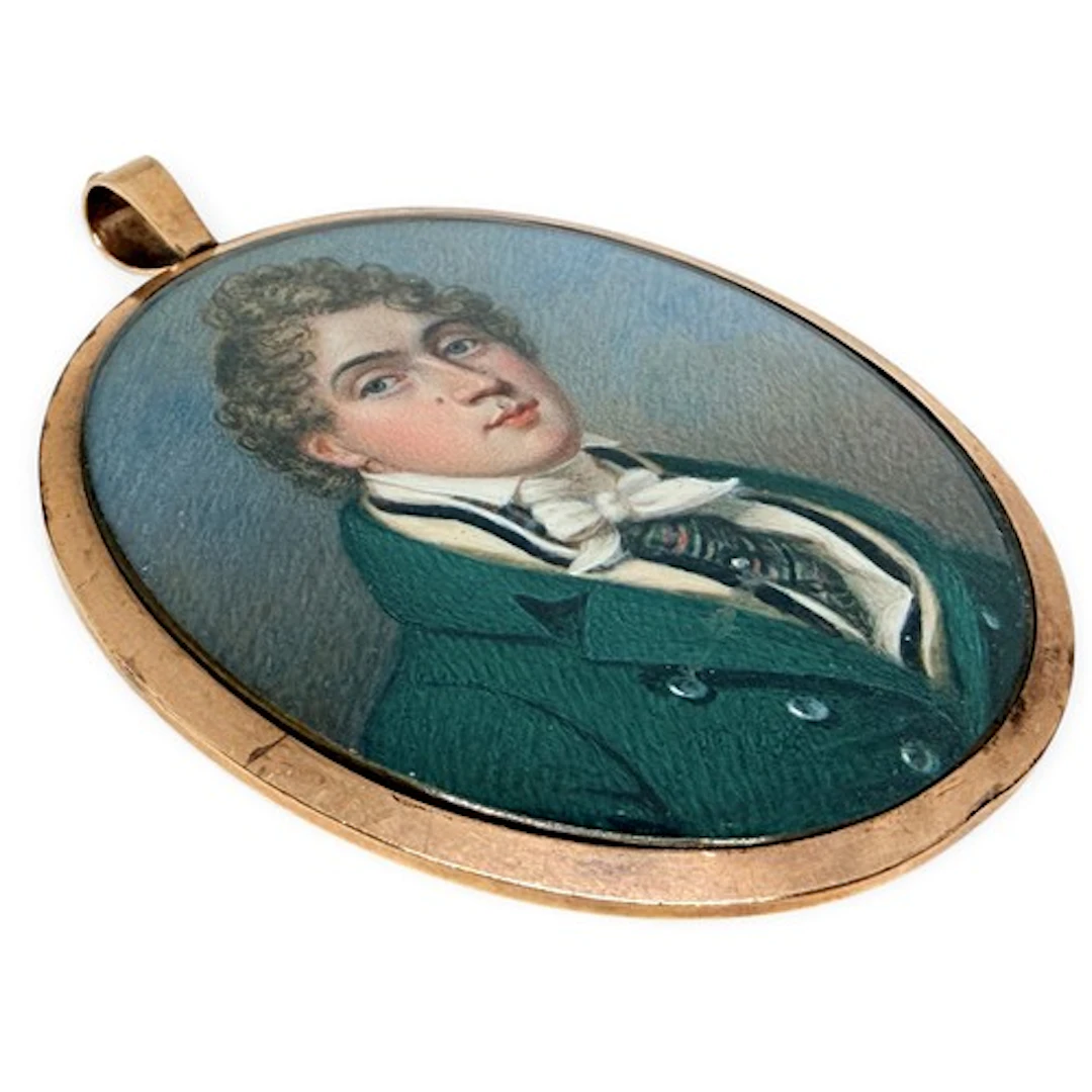 An early 19th century portrait miniature of a gentleman wear...