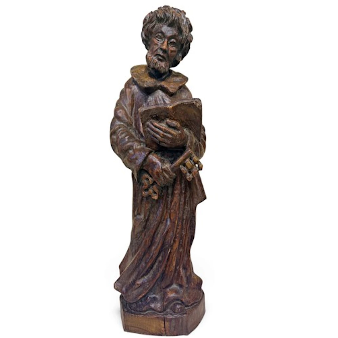 A carved oak statue, figure of Saint Peter the Apostle, depi...