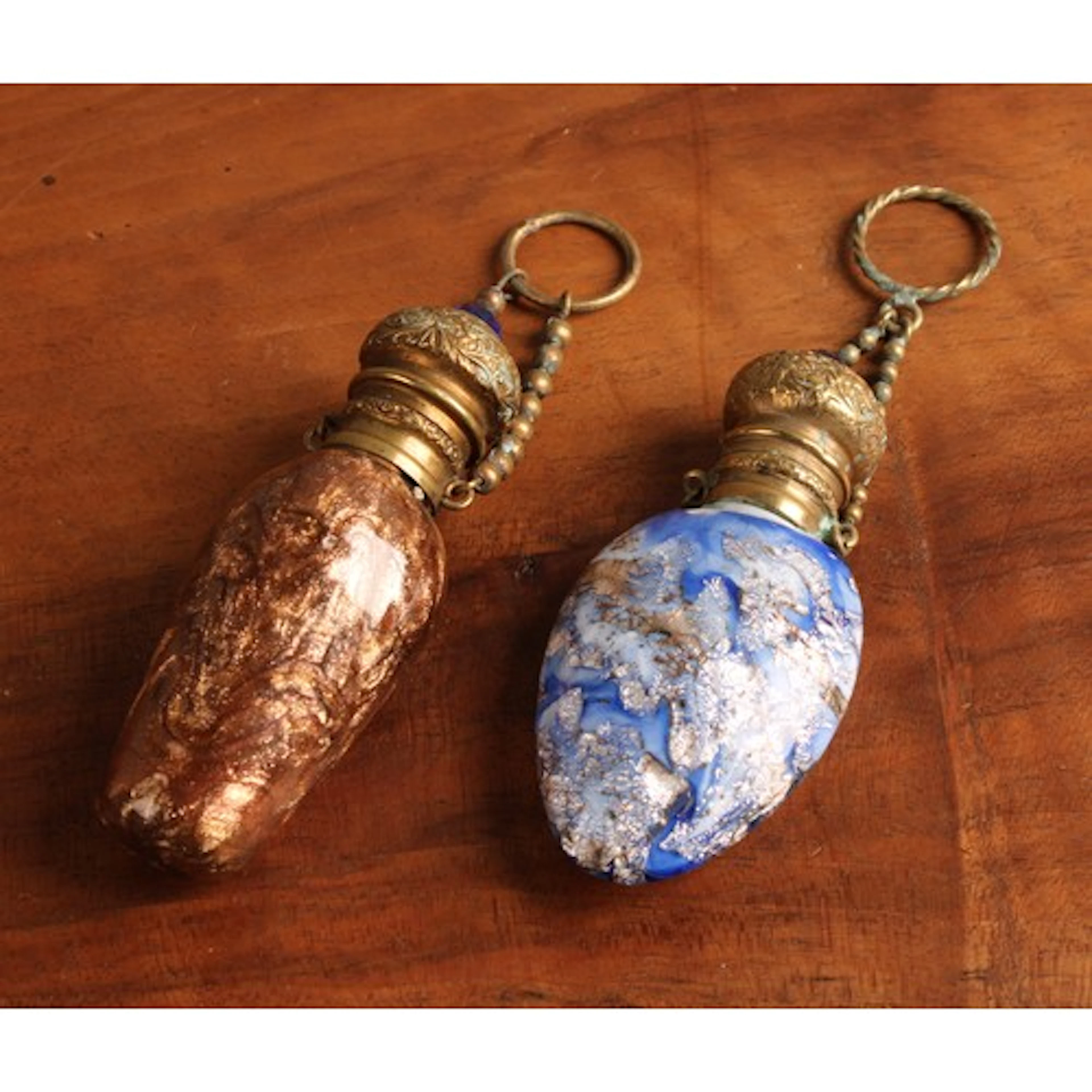 A 19th century Venetian glass ovoid scent bottle, hinged bra...