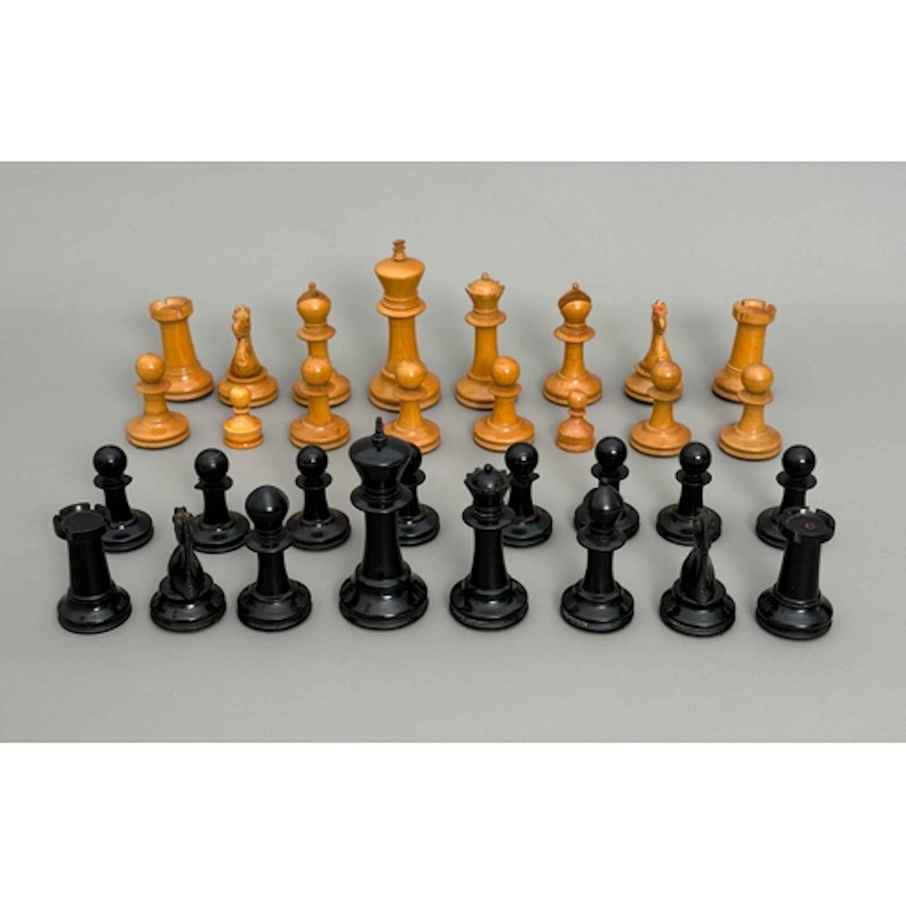 An ebony and boxwood Staunton pattern chess set - the kings ...