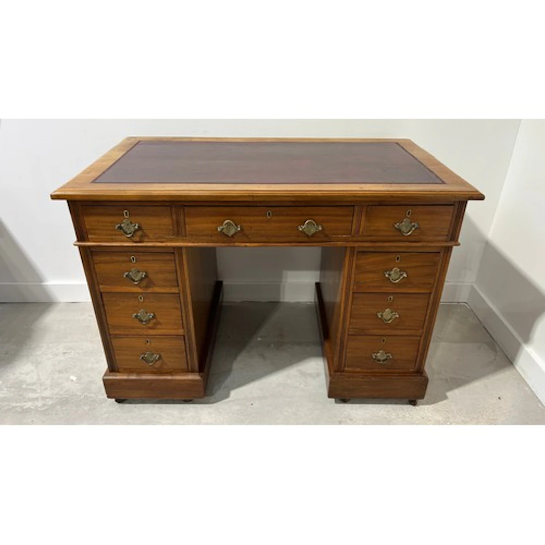 Mahogany pedestal desk, the moulded rectangular top fitted w...